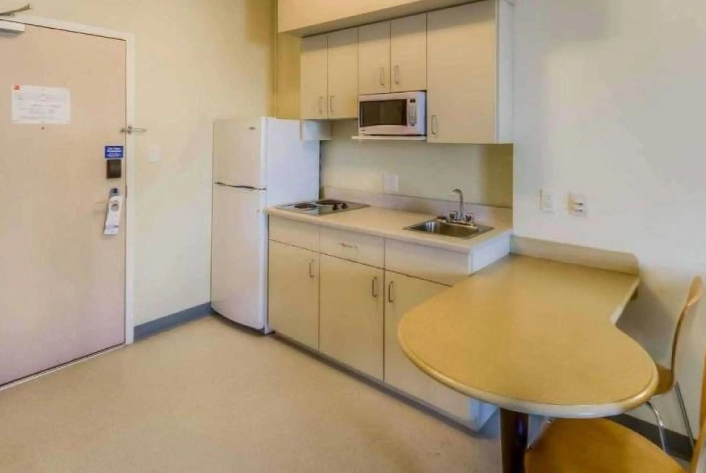 Kitchen or kitchenette in Super 8 by Wyndham Estevan