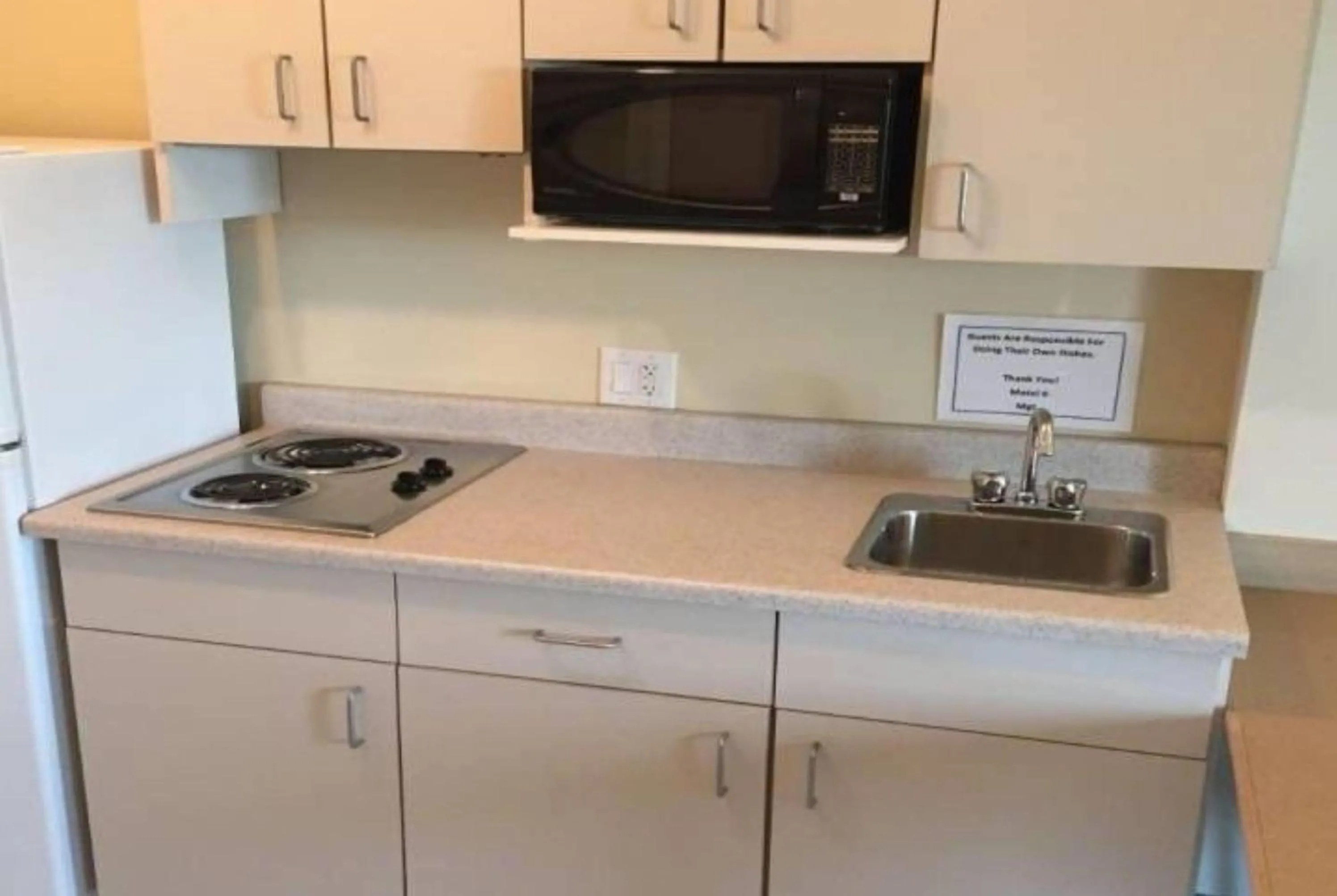 Kitchen or kitchenette in Super 8 by Wyndham Estevan