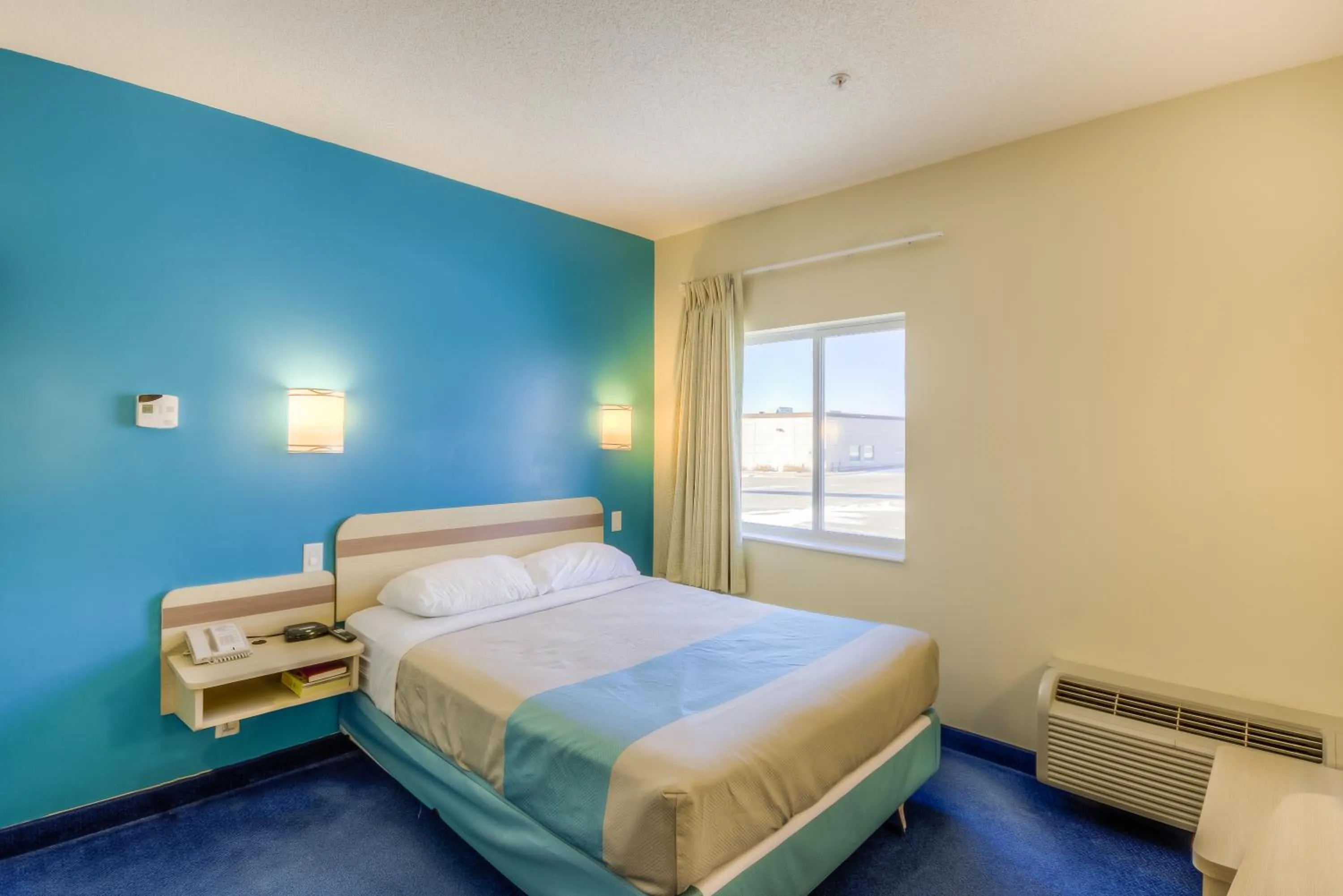 Bed in Aurora Inn Estevan