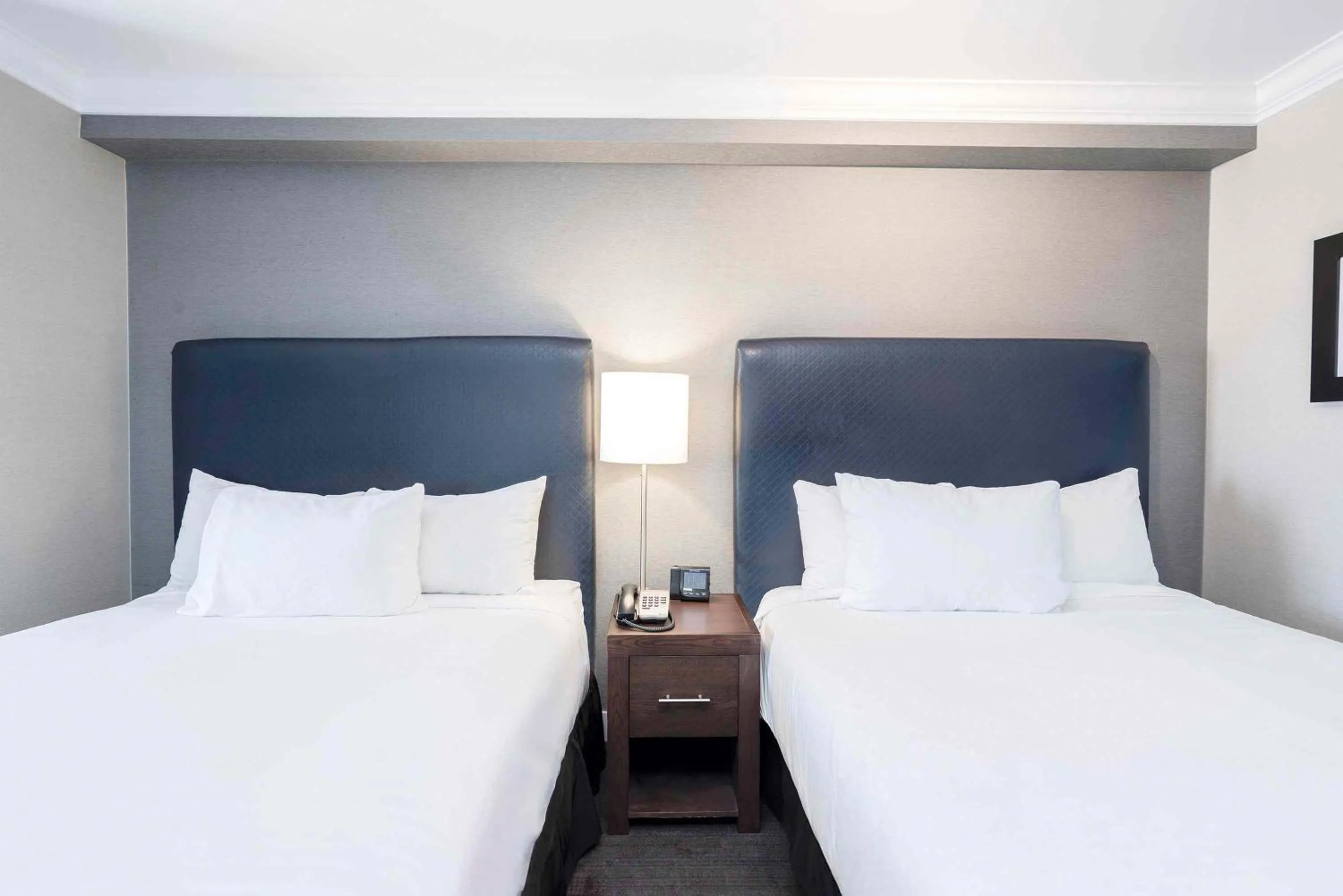 Photo of the whole room, Bed in Sandman Signature Prince George Hotel