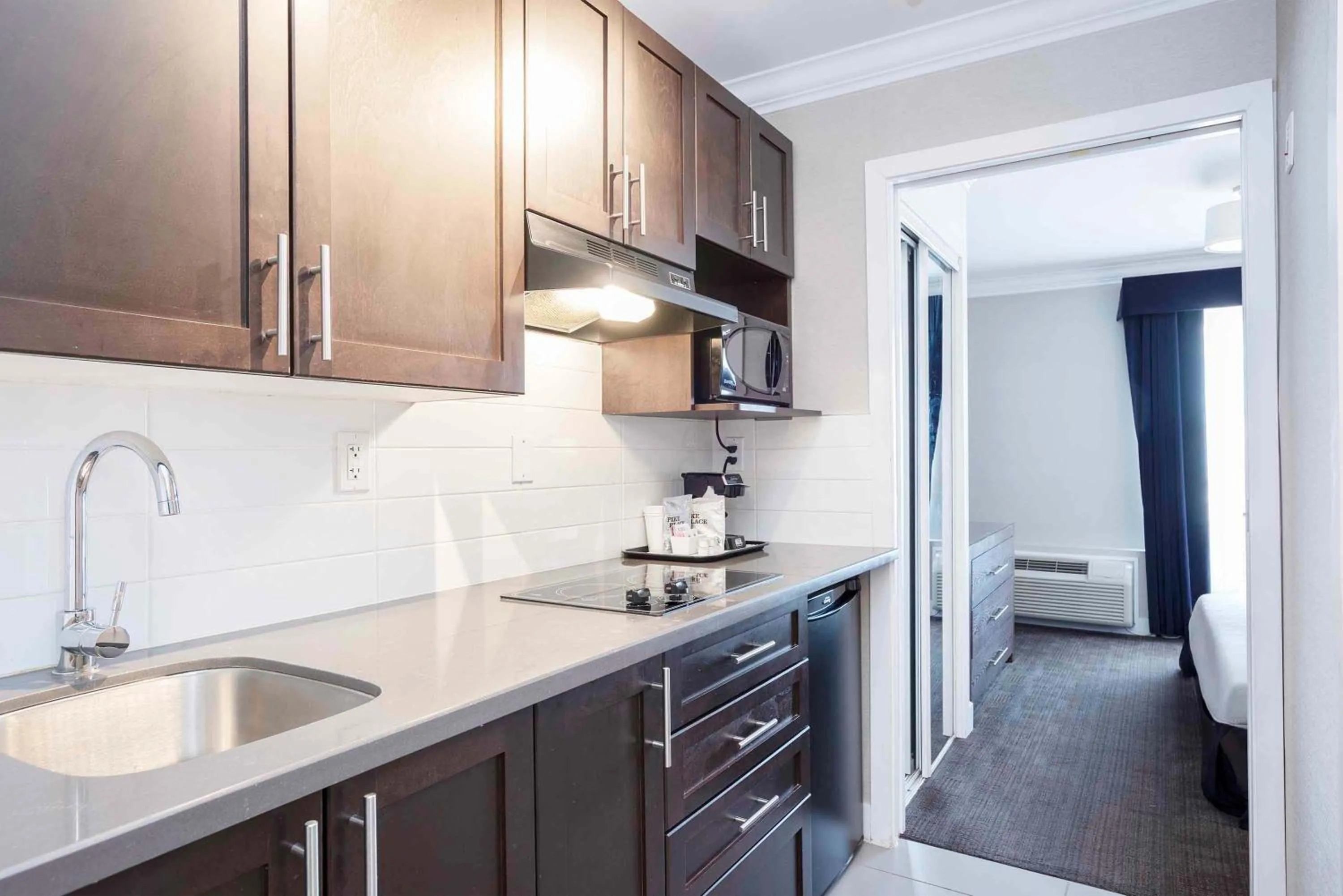 Kitchen or kitchenette in Sandman Signature Prince George Hotel