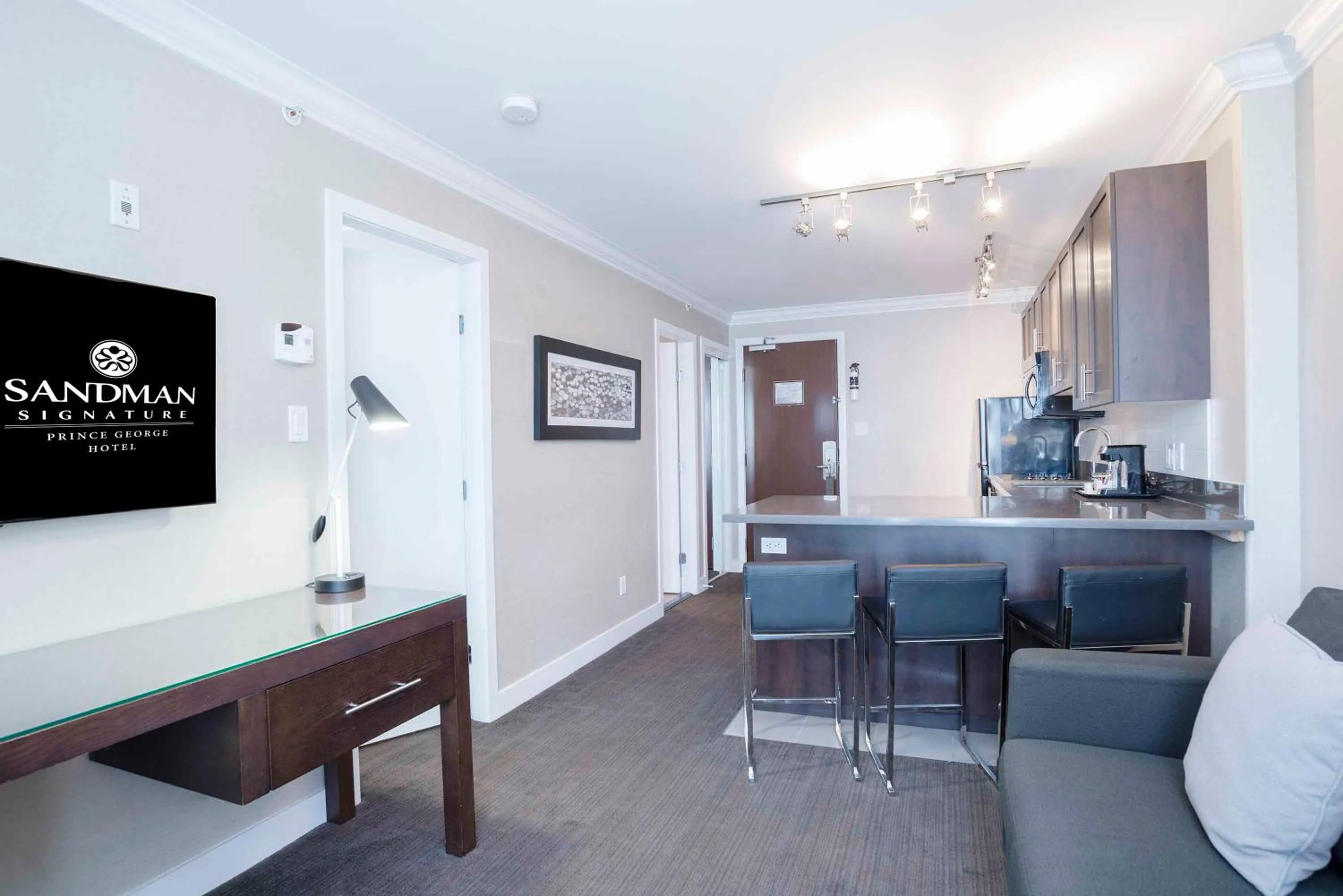 Living room in Sandman Signature Prince George Hotel