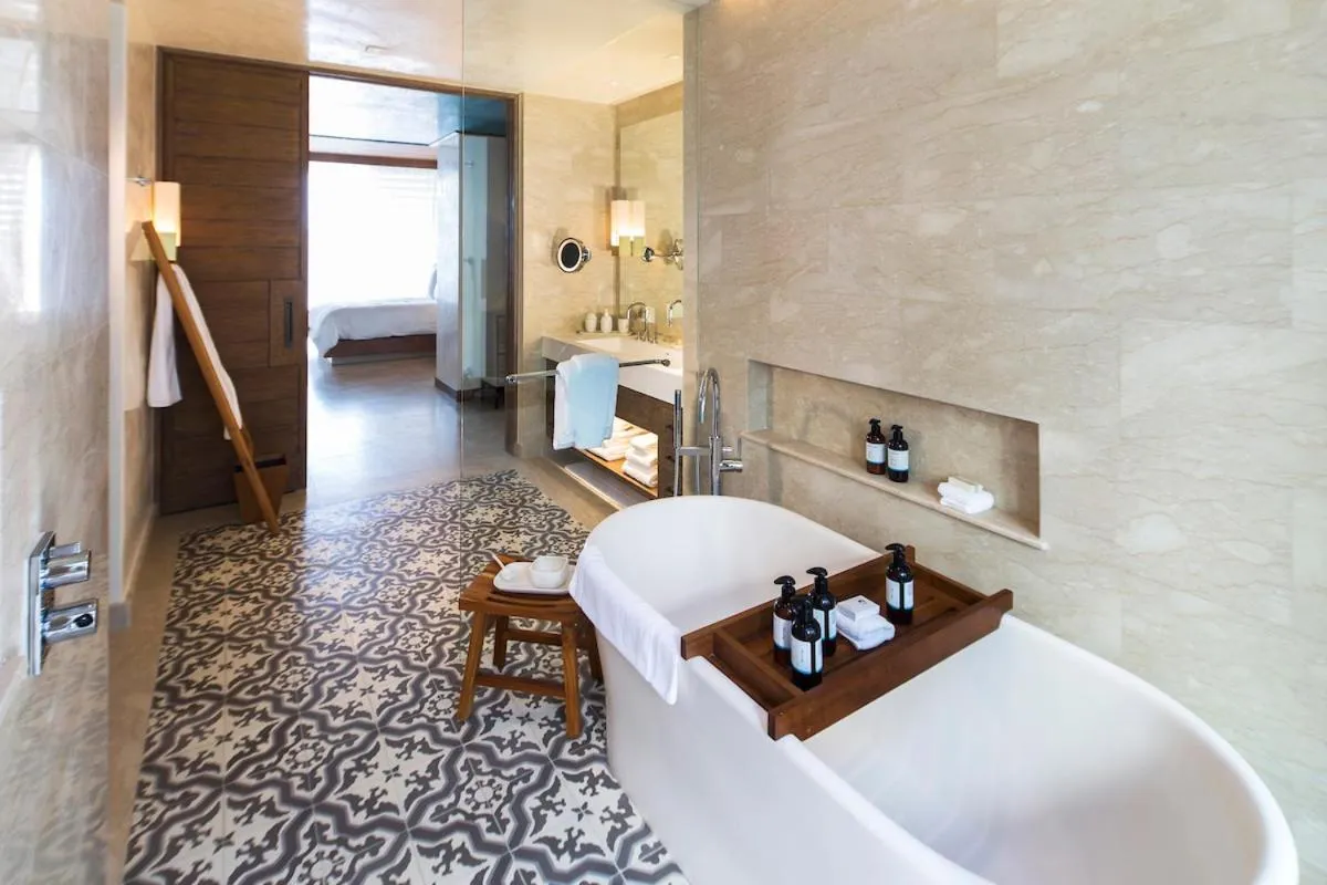 Bed in Chileno Bay Resort & Residences, Auberge Collection