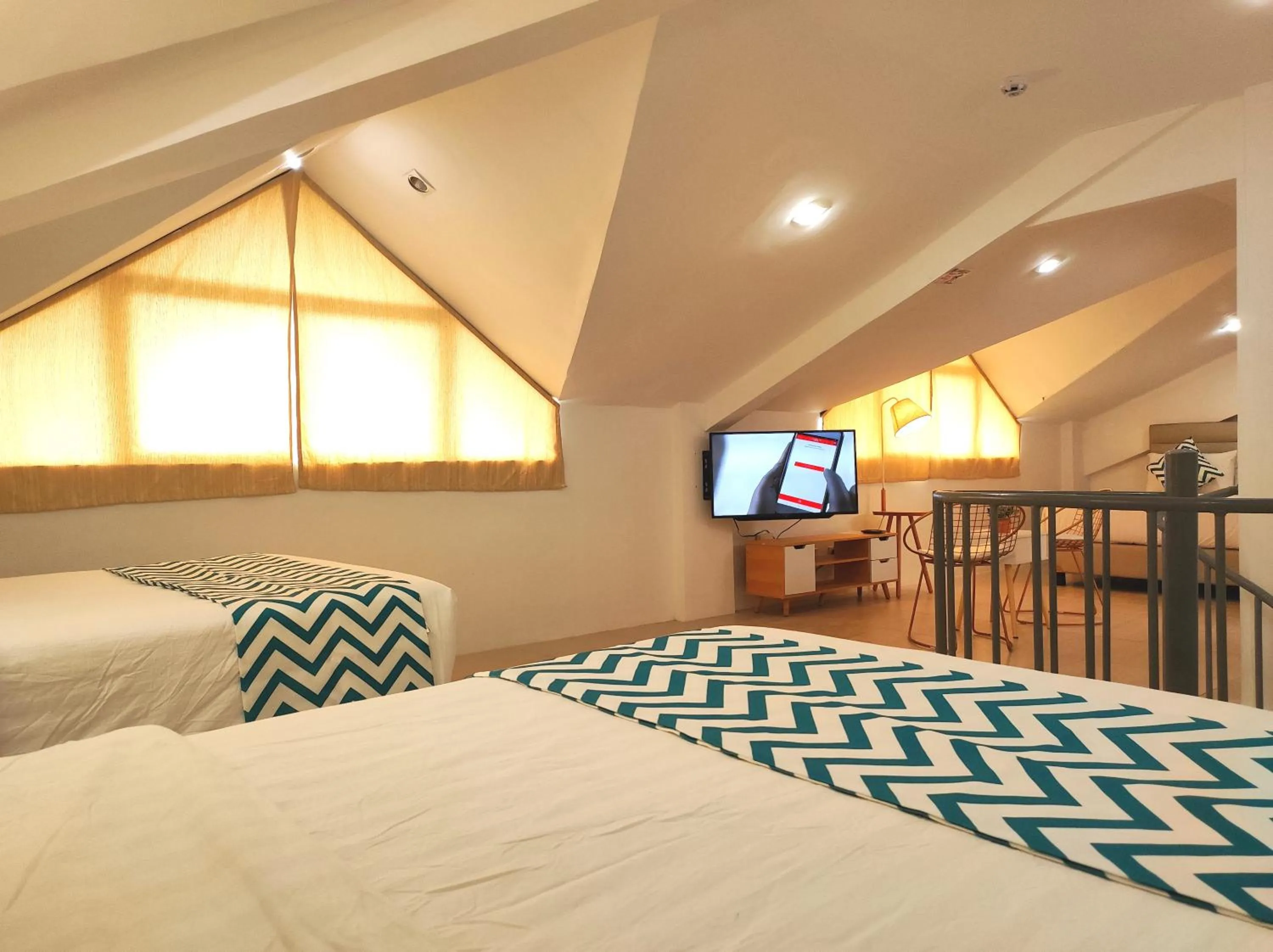 Bed in Grand Blue Beach Hotel