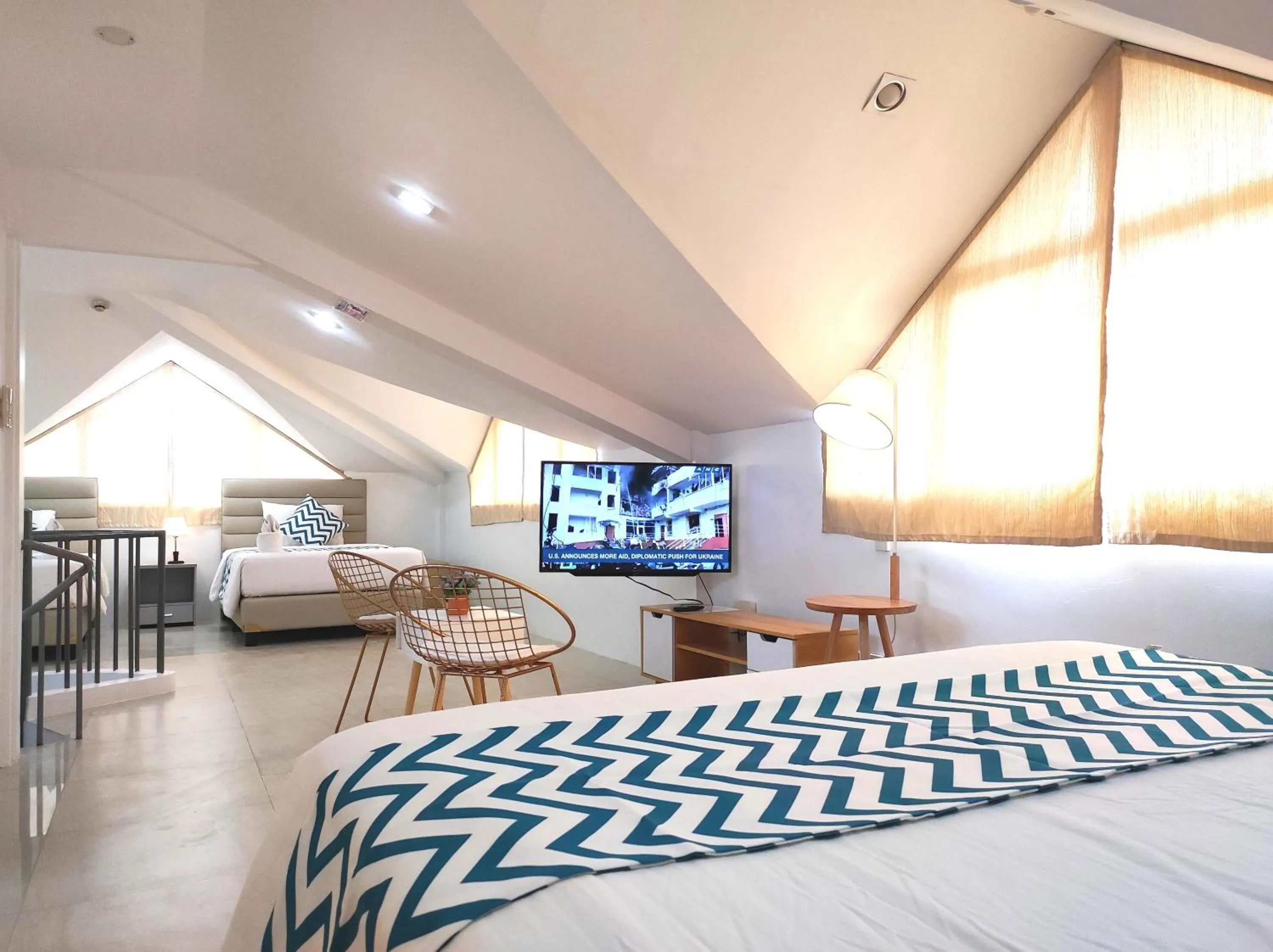 Bed in Grand Blue Beach Hotel