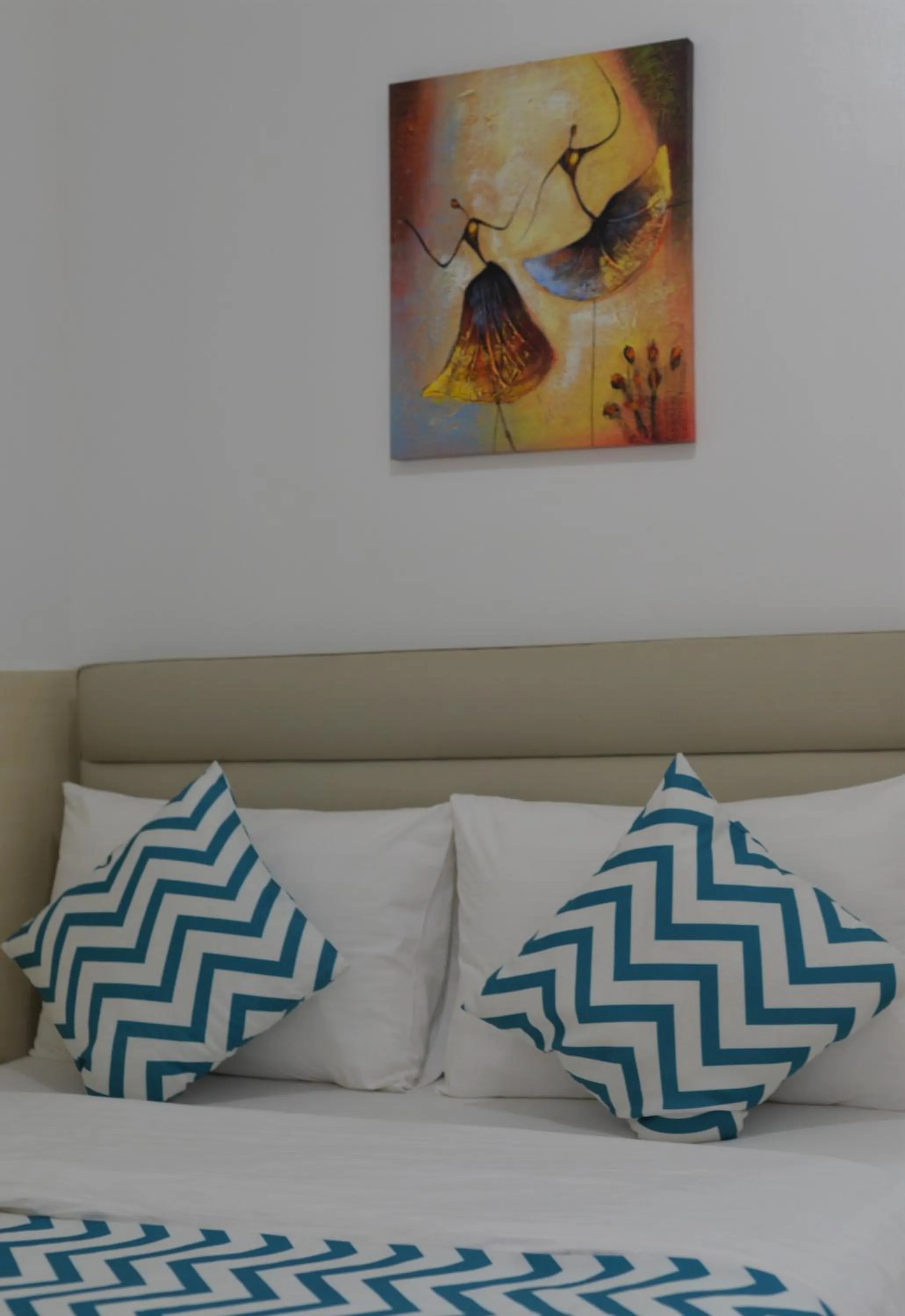 Bed in Grand Blue Beach Hotel