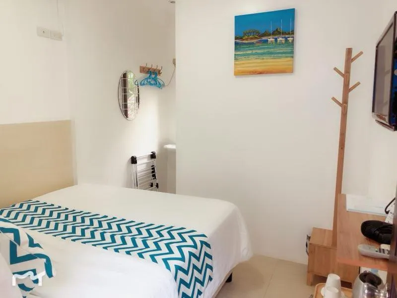 Bed in Grand Blue Beach Hotel