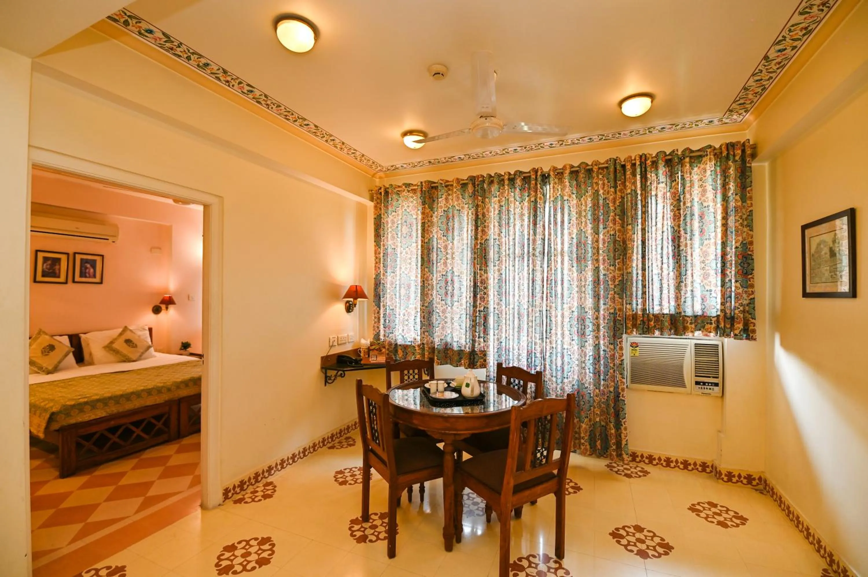 Living room, Bed in Om Niwas Suite Hotel