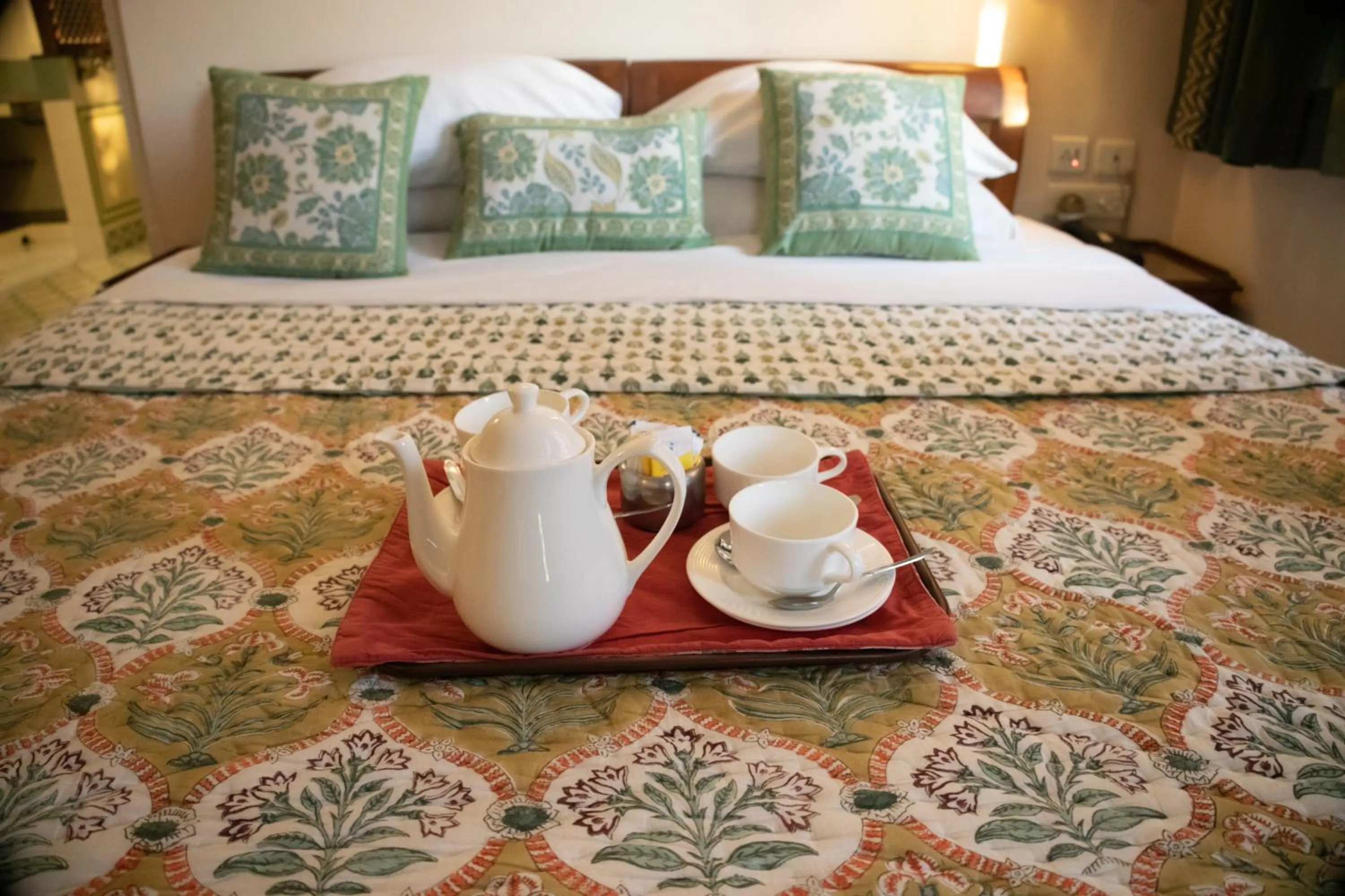 Bed in Om Niwas Suite Hotel