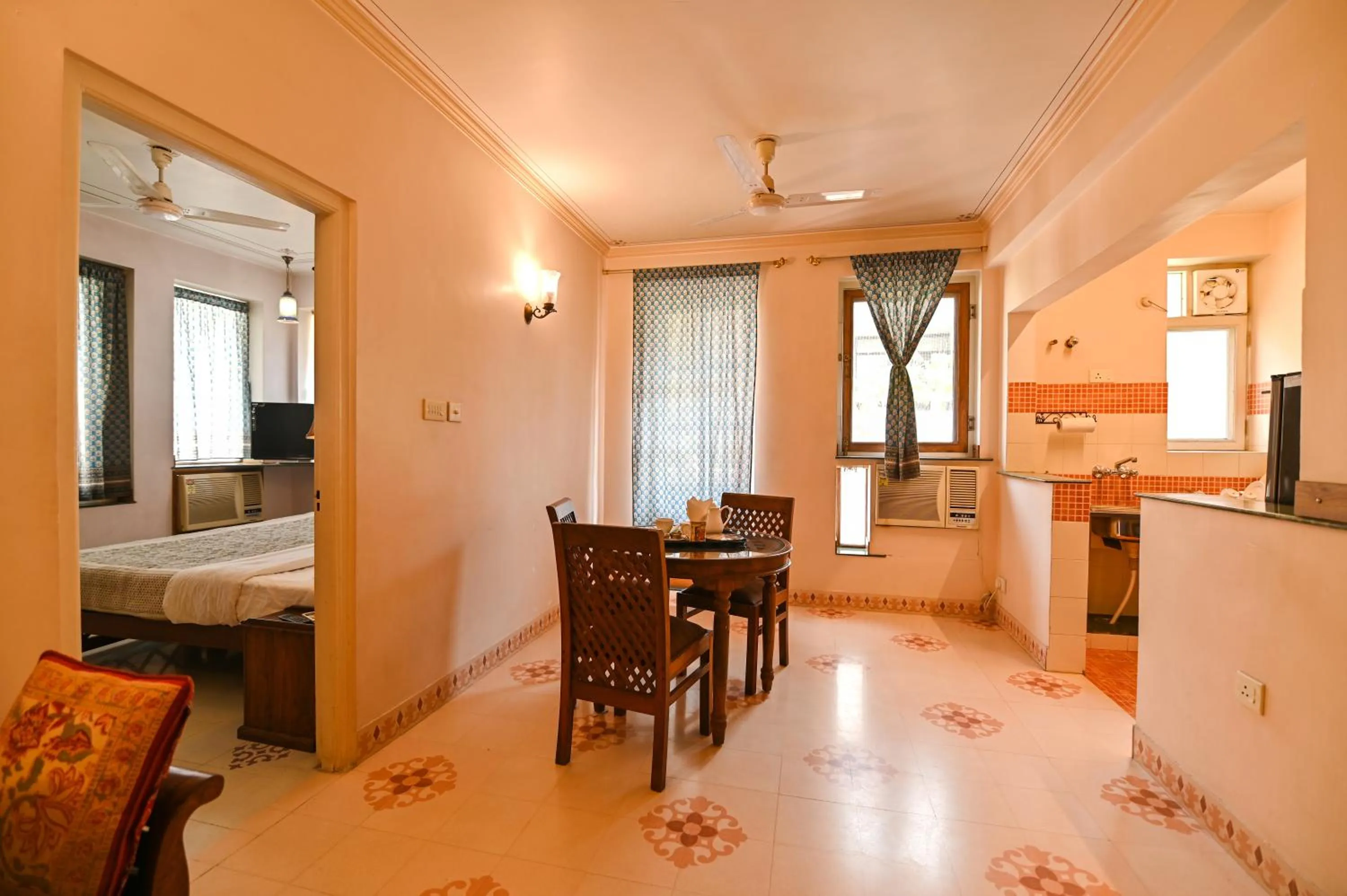 Living room, Bed in Om Niwas Suite Hotel