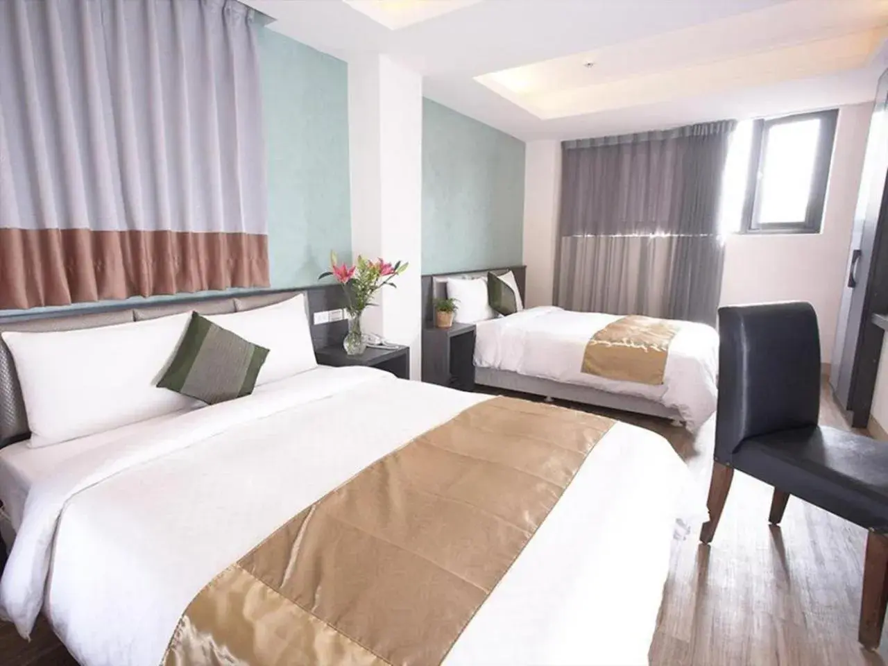 Bed in Jin Bao Hotel