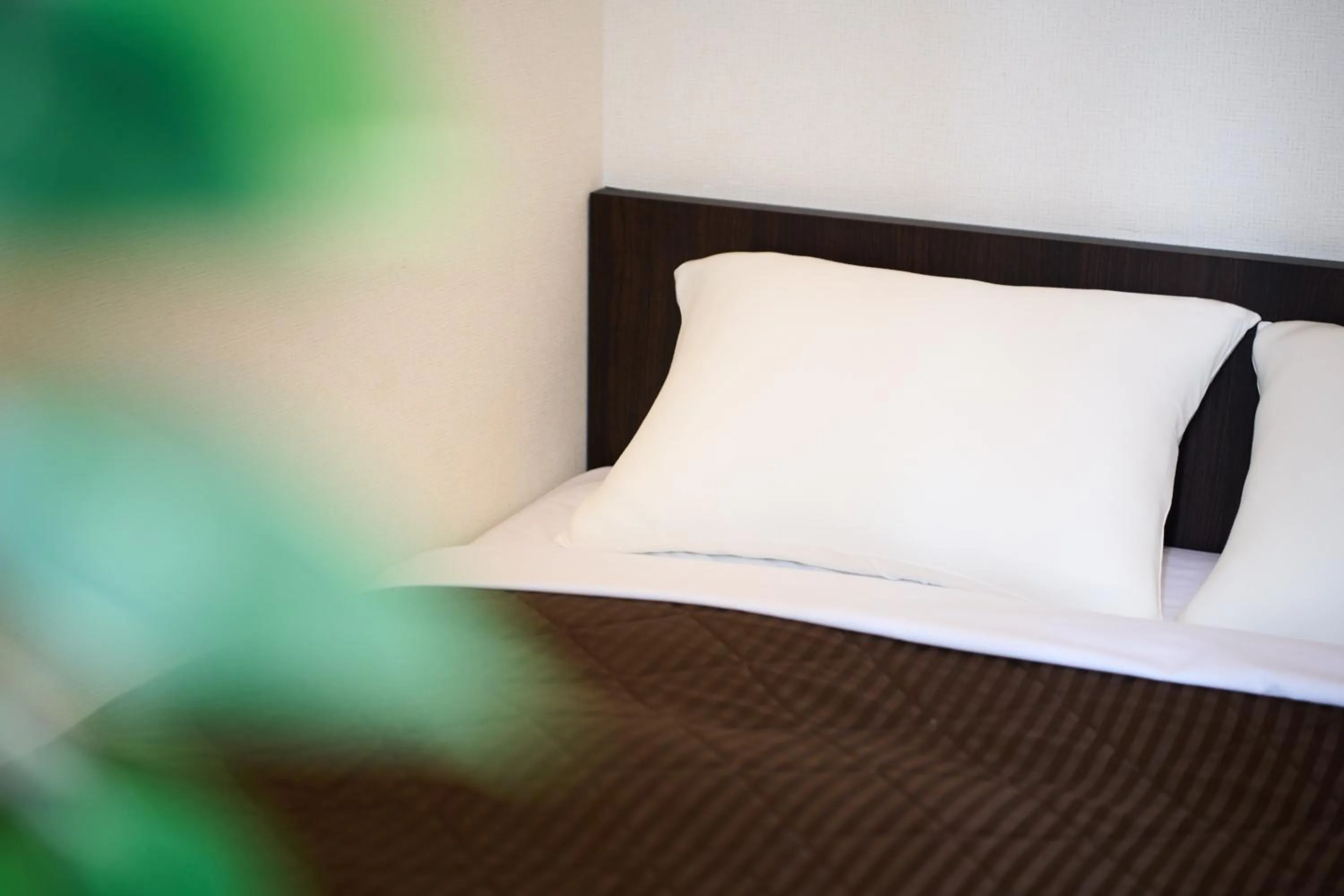 Bed in Hotel Sho Sapporo