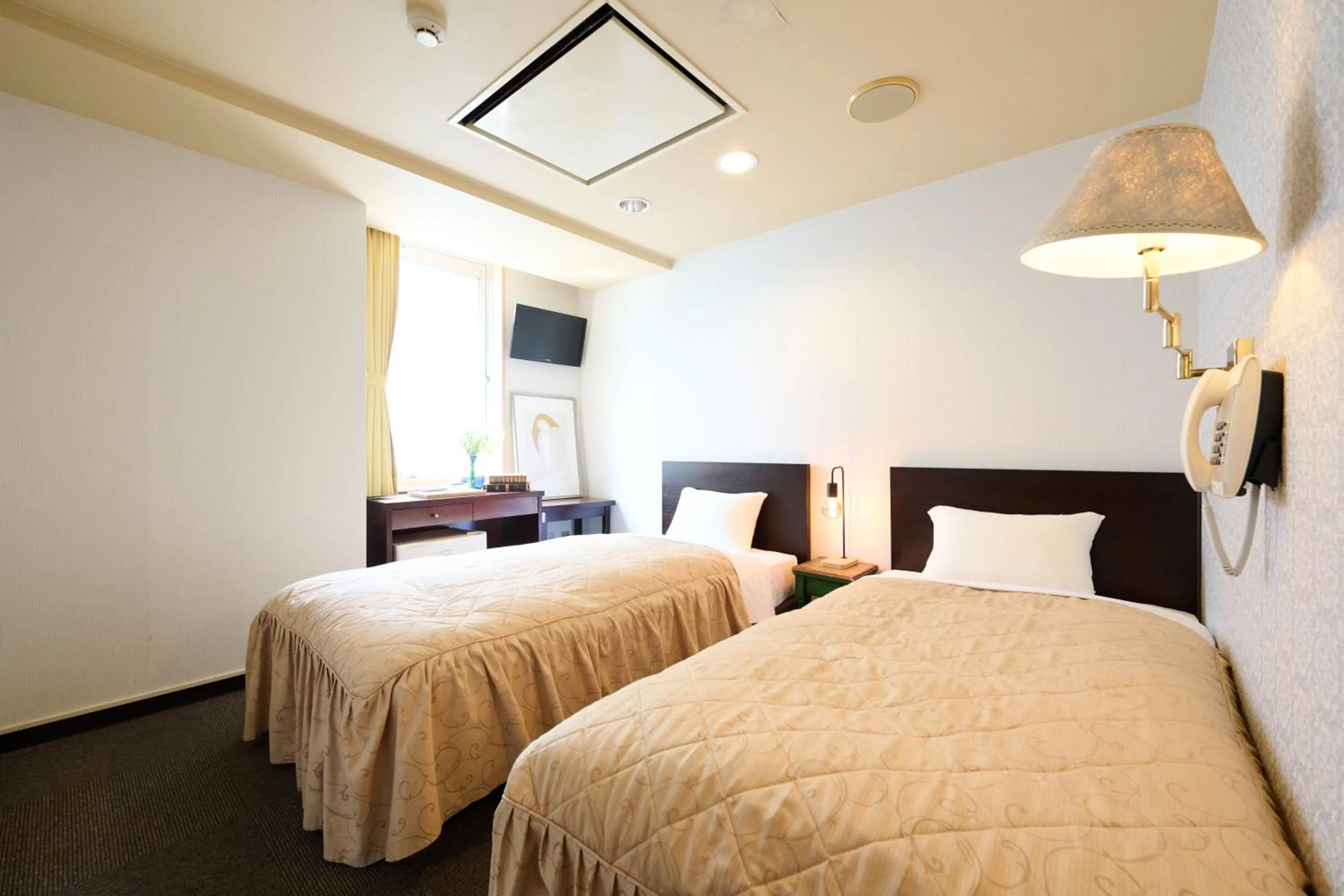 Bed in Hotel Sho Sapporo