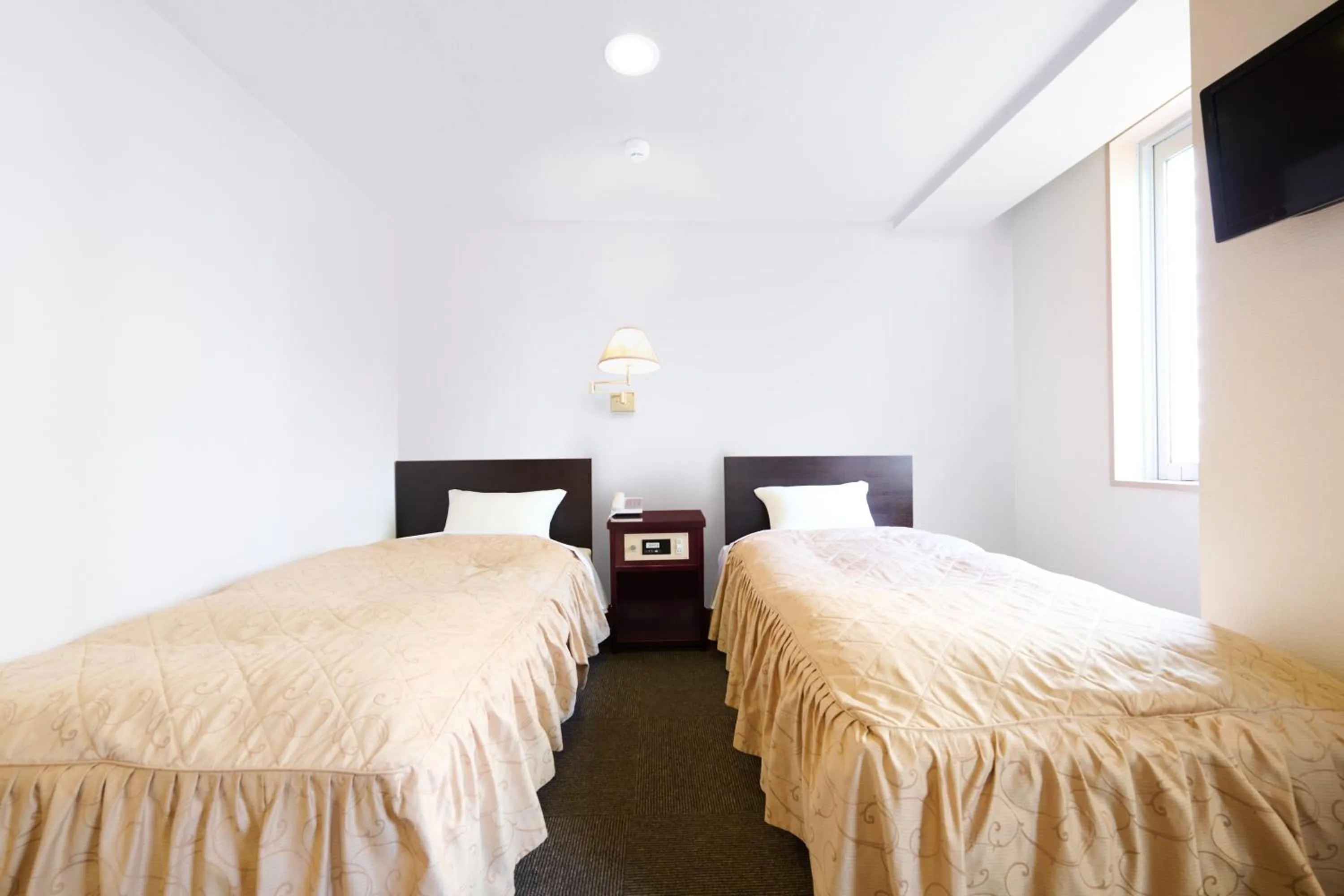 Bed in Hotel Sho Sapporo