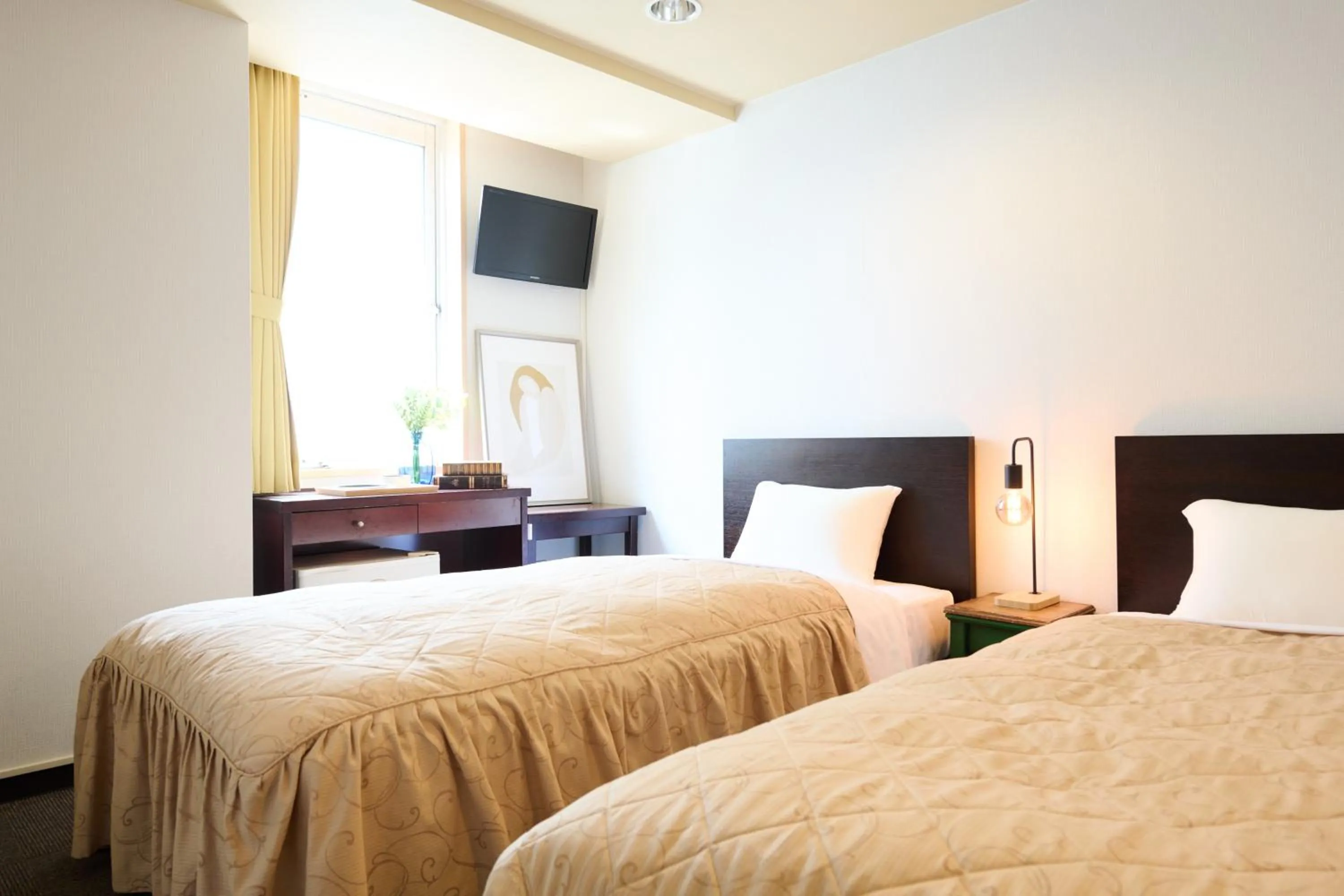 Bed in Hotel Sho Sapporo