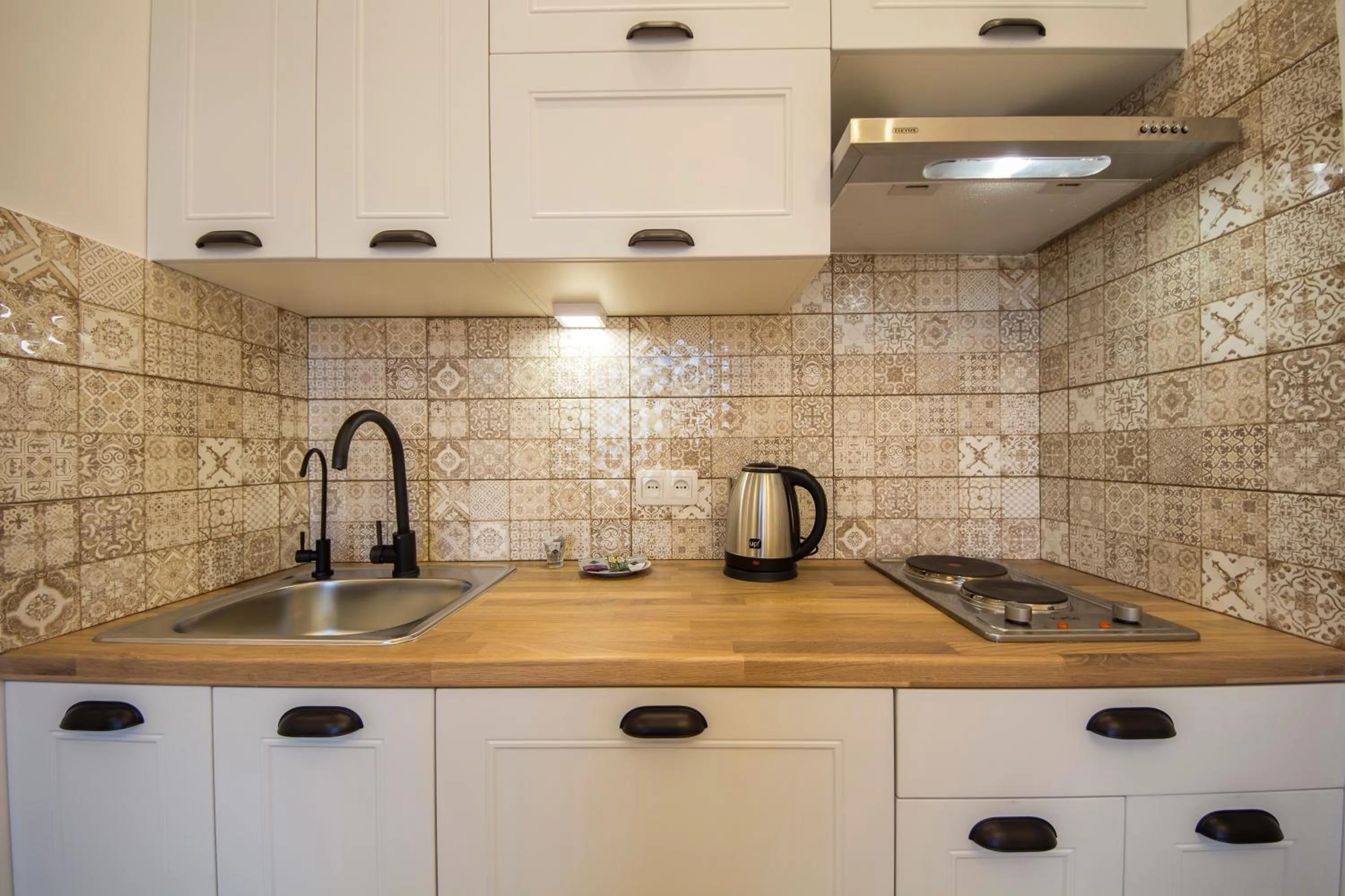 Kitchen or kitchenette in Central Dayflat Apartments