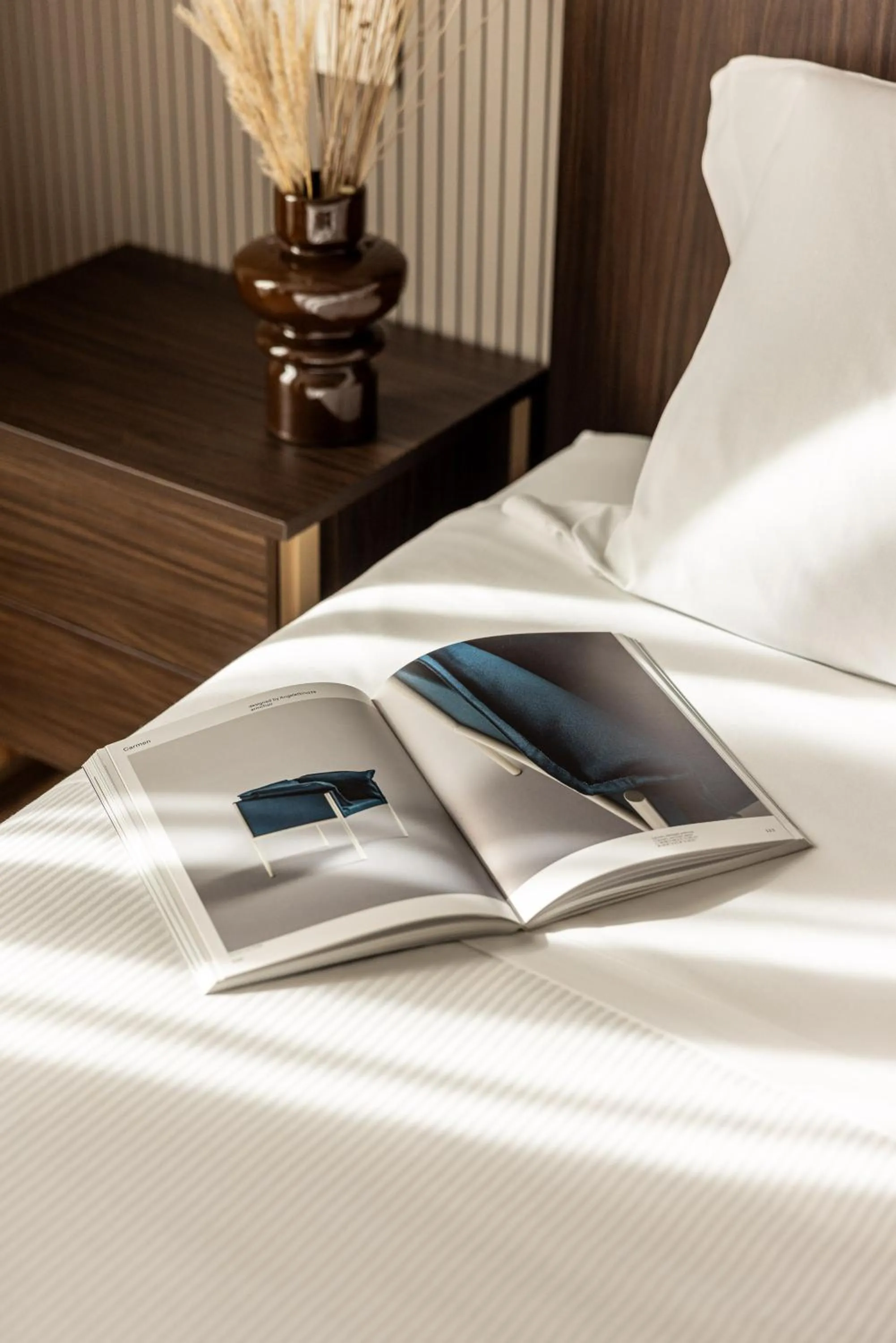 Bed in Aramis Deluxe Rooms