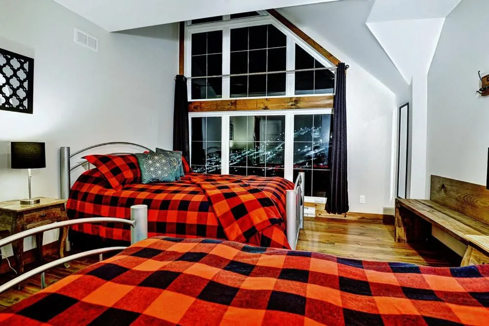 Bed in Le Sto Shack 25 Chemin Blanc by Les Chalets Alpins