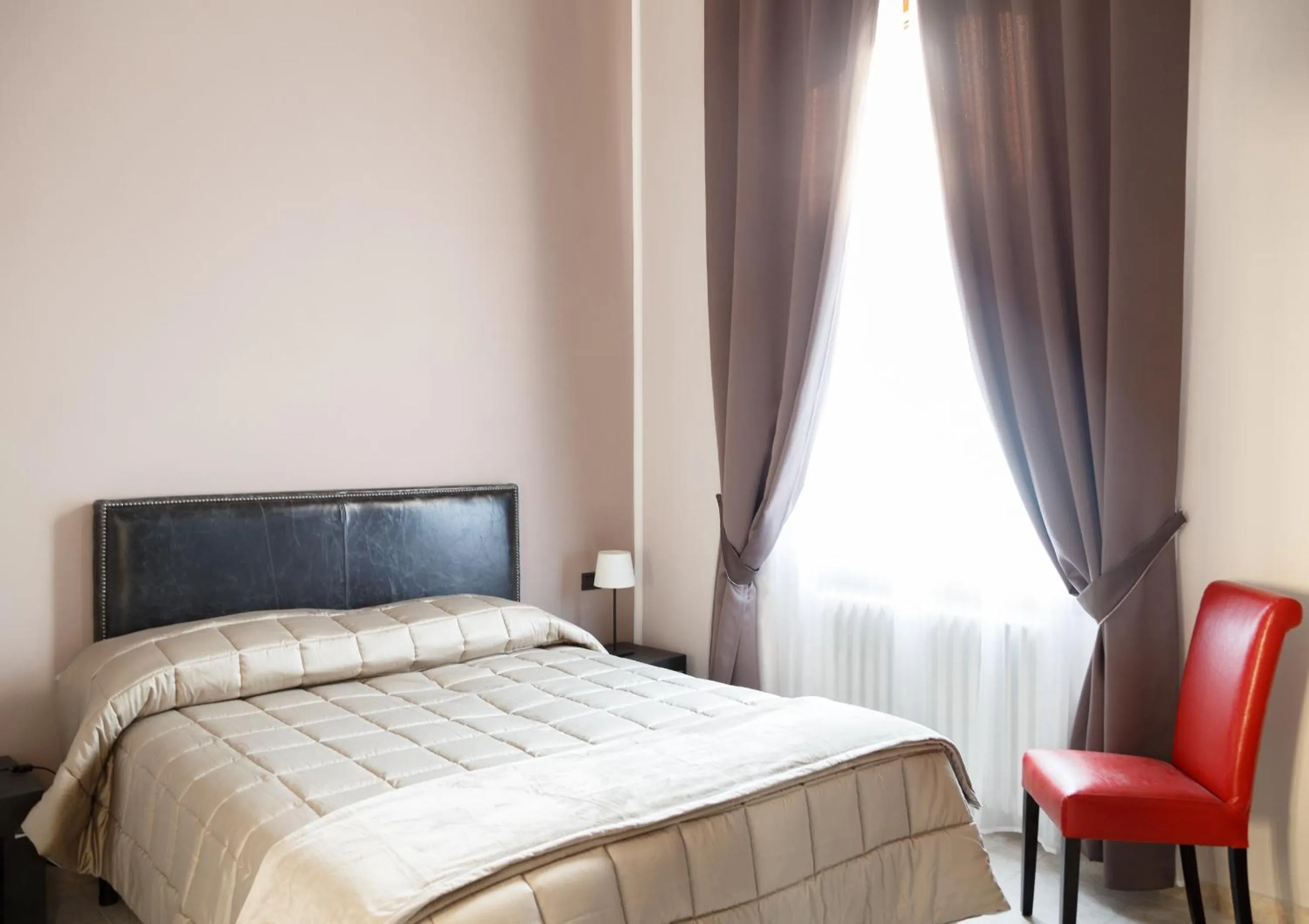 Bed in Leone X Guest House