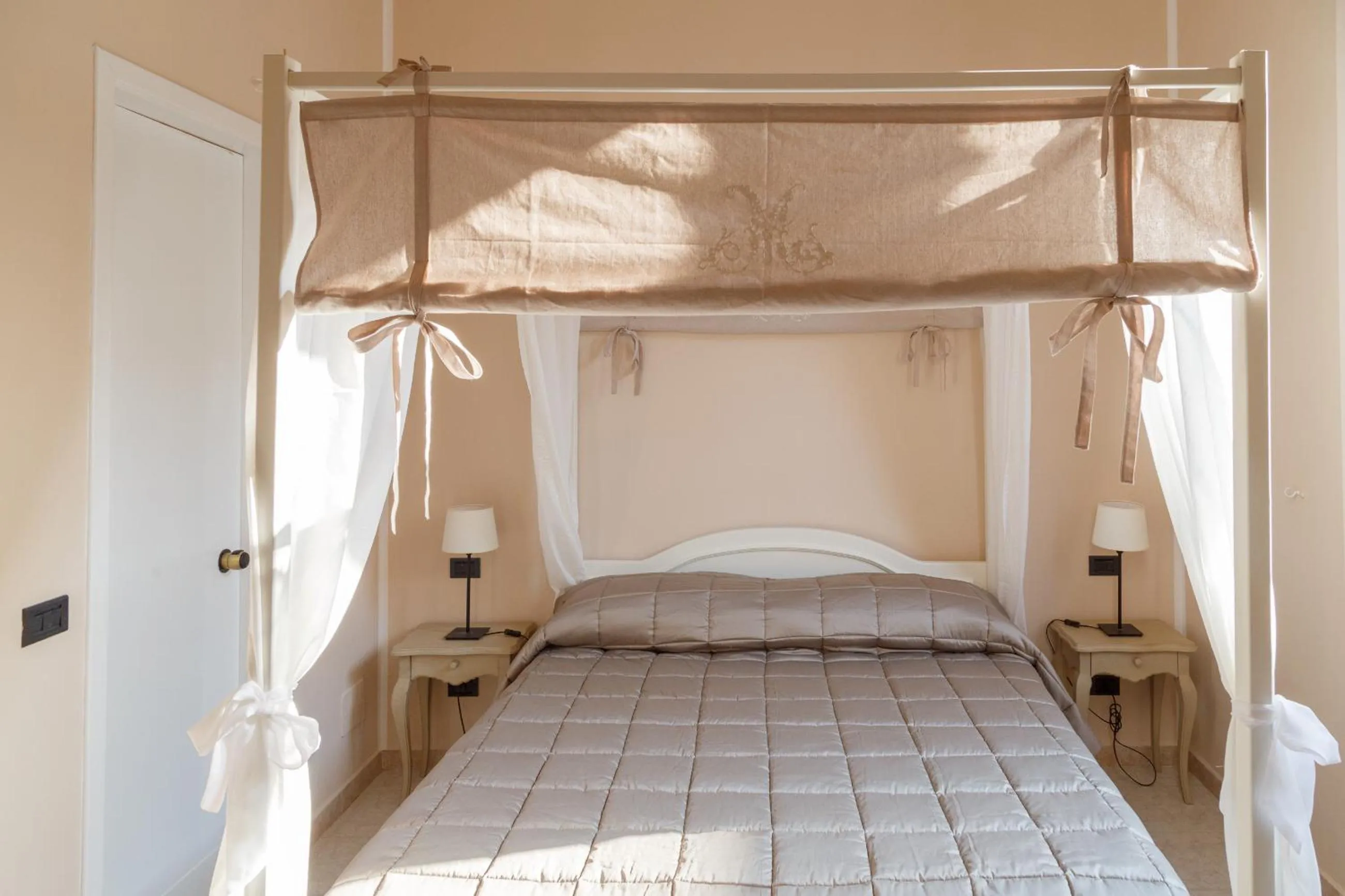 Bed in Leone X Guest House