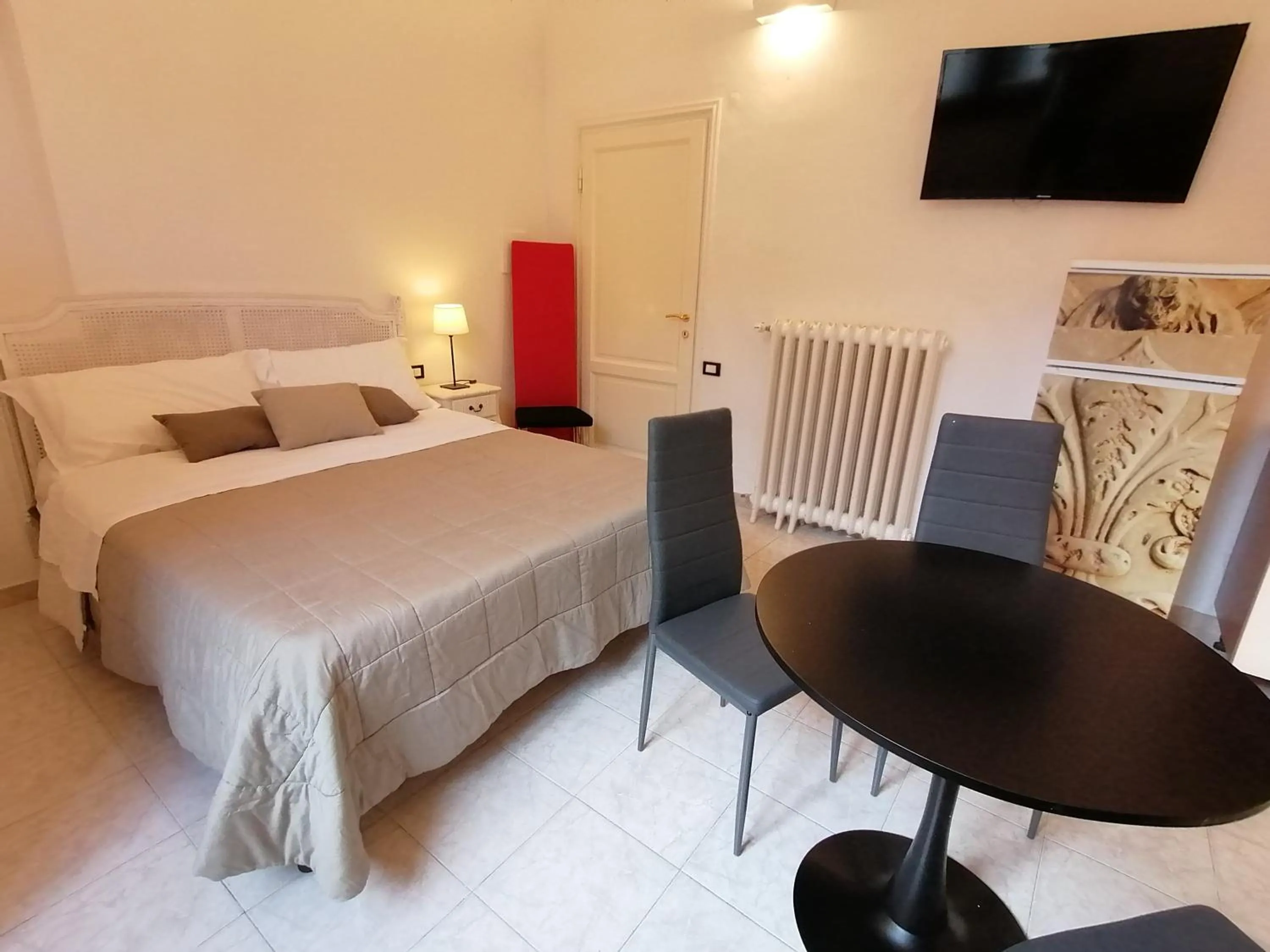 Bed in Leone X Guest House