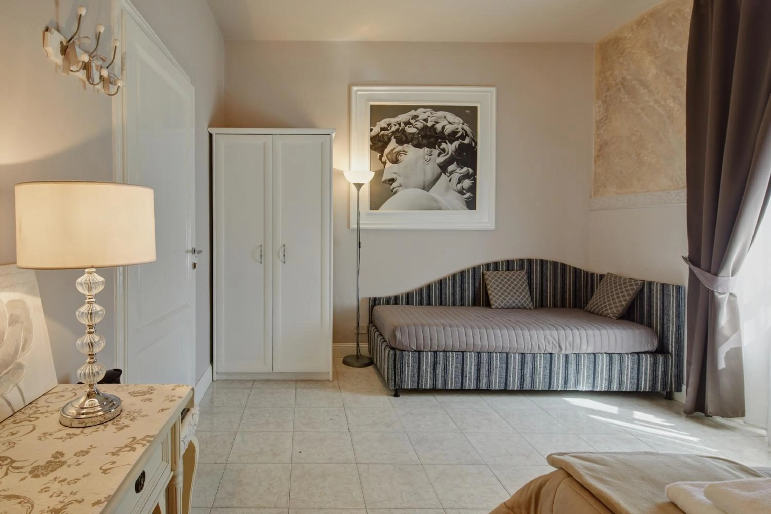 Bed in Leone X Guest House