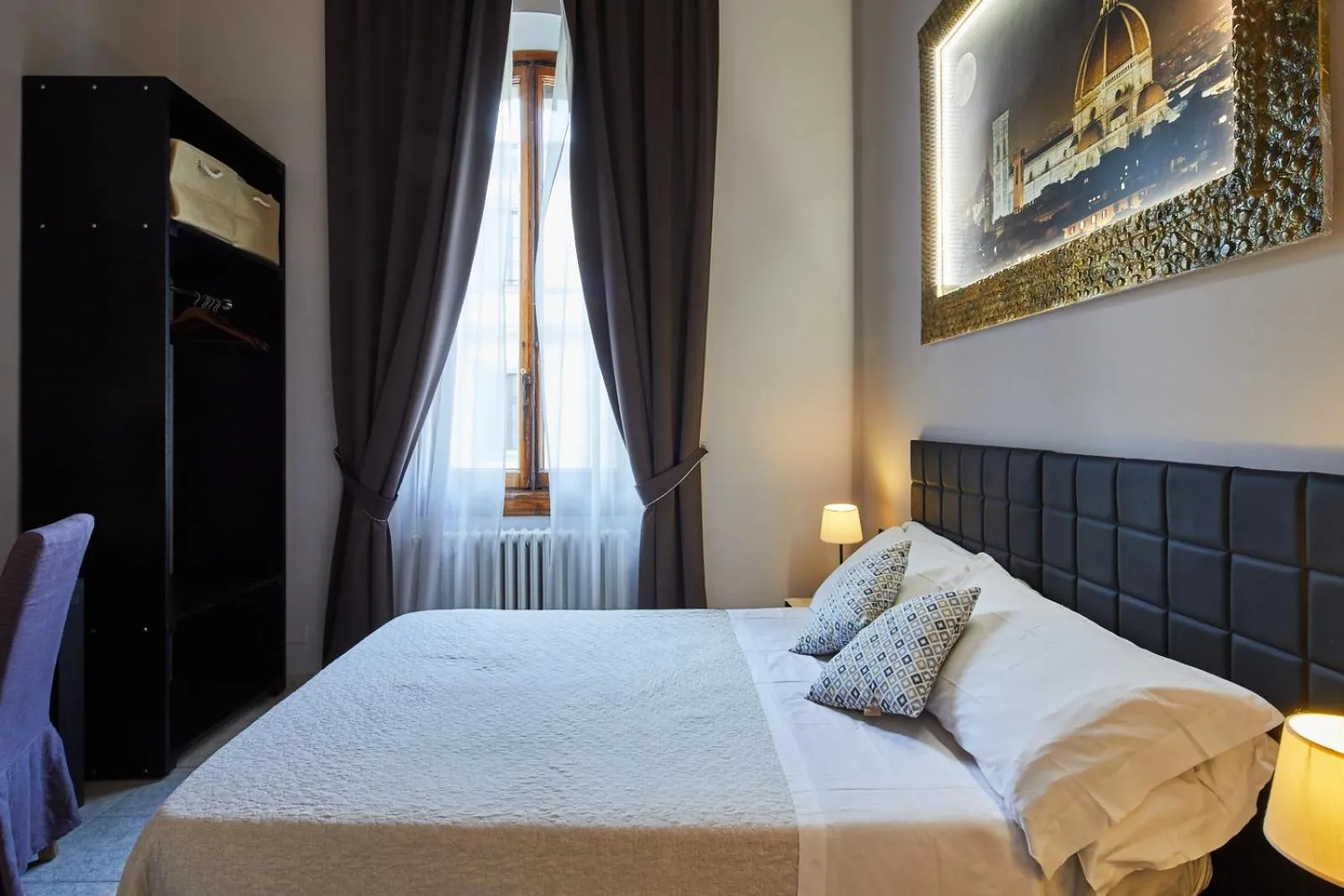 Bed in Leone X Guest House