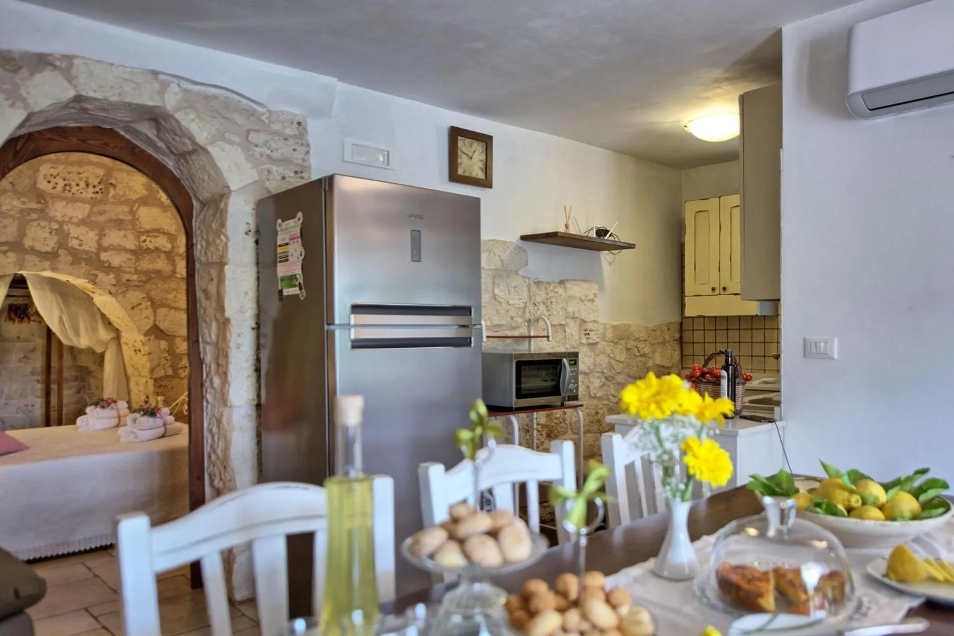 Kitchen or kitchenette in Trullo Santo Stefano by PosarelliVillas