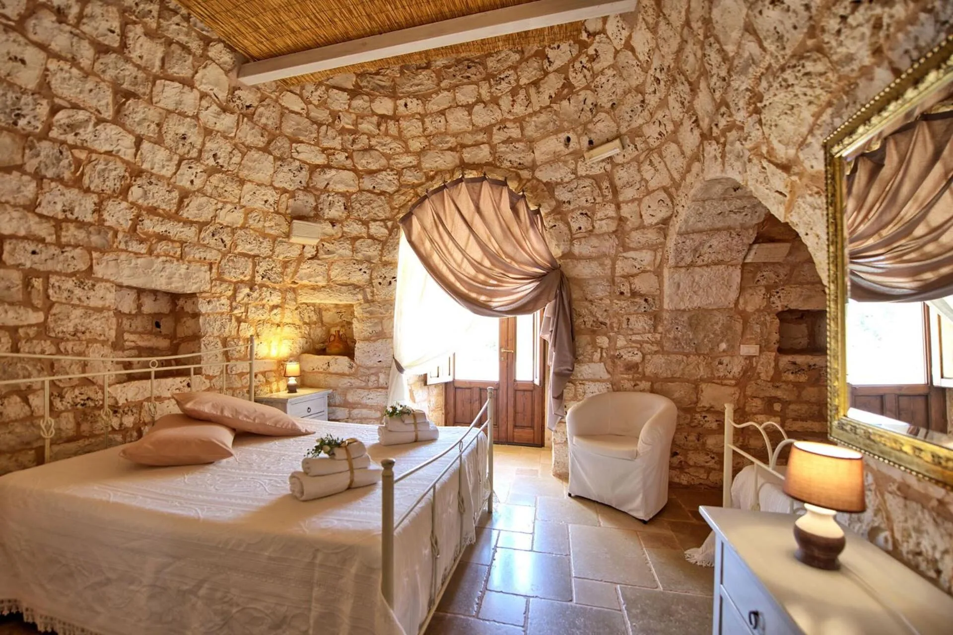 Bed in Trullo Santo Stefano by PosarelliVillas