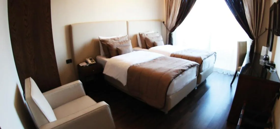 Photo of the whole room, Bed in Royal Garden Hotel