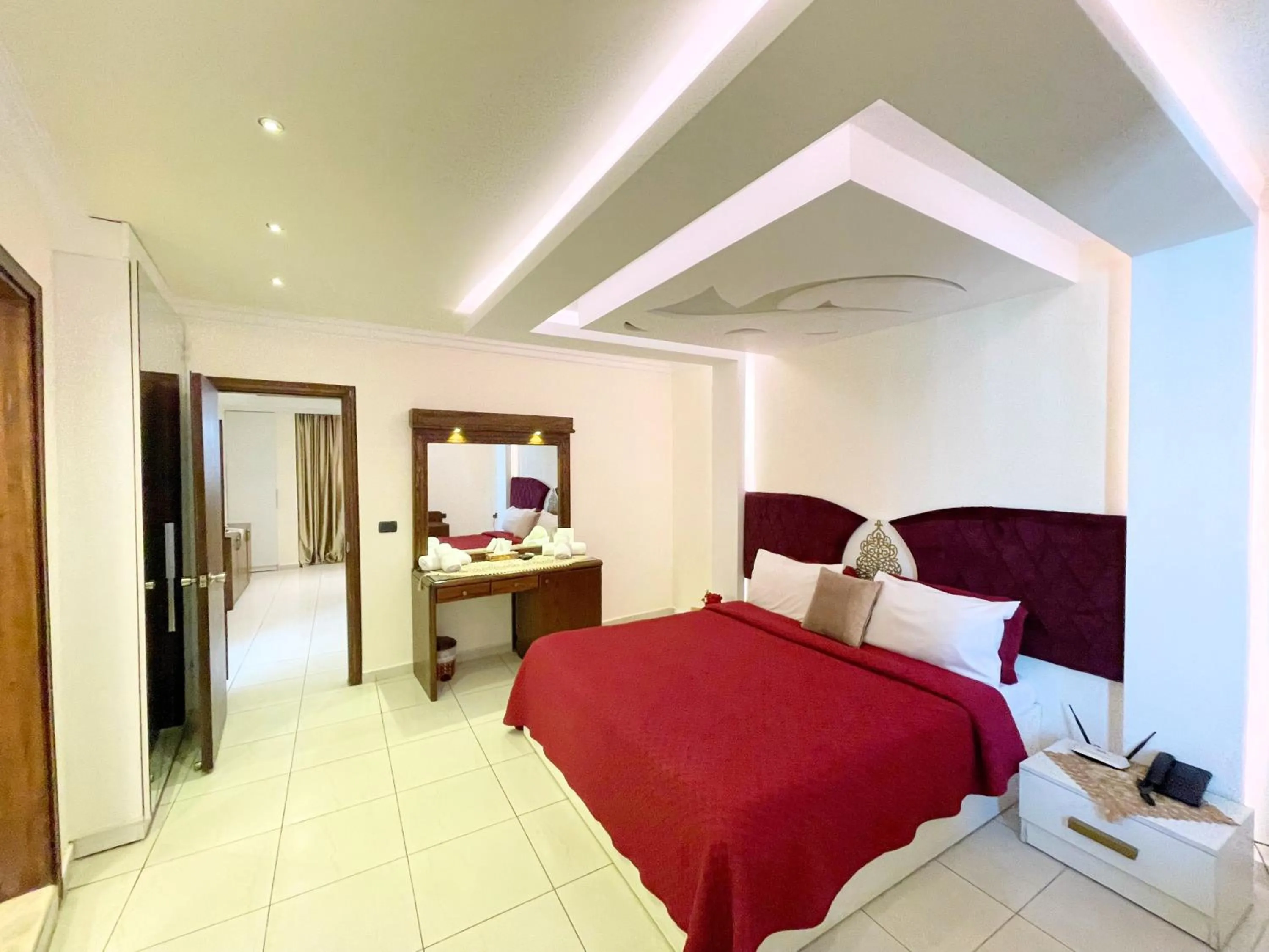 Bed in Royal Garden Hotel