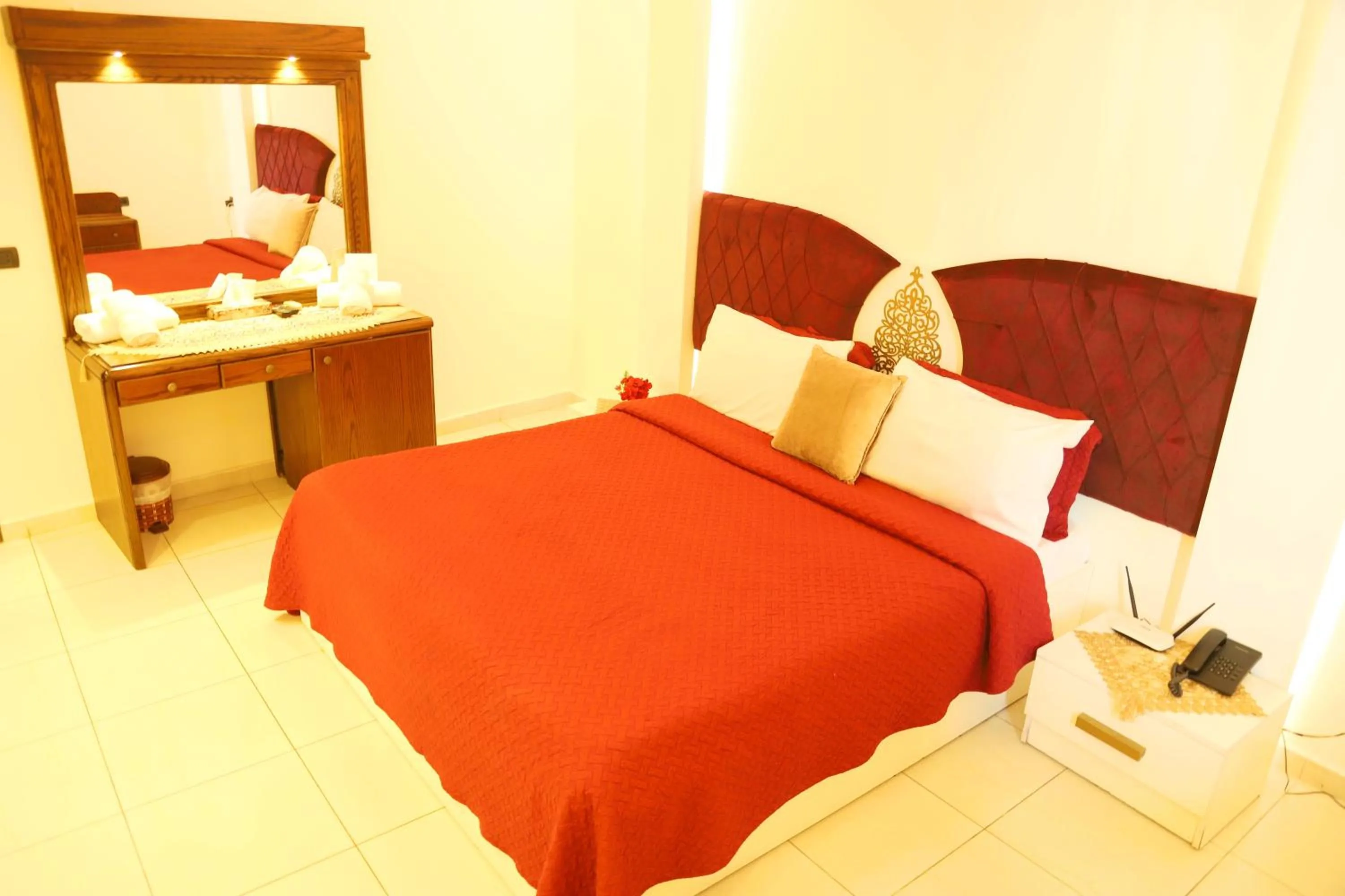 Bed in Royal Garden Hotel