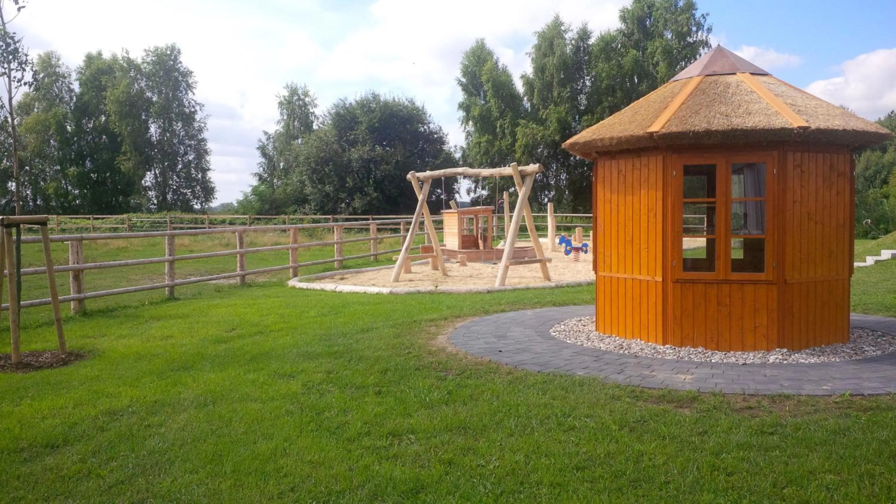 Children play ground in Friesenhof Hotel-Restaurant-Reitanlage
