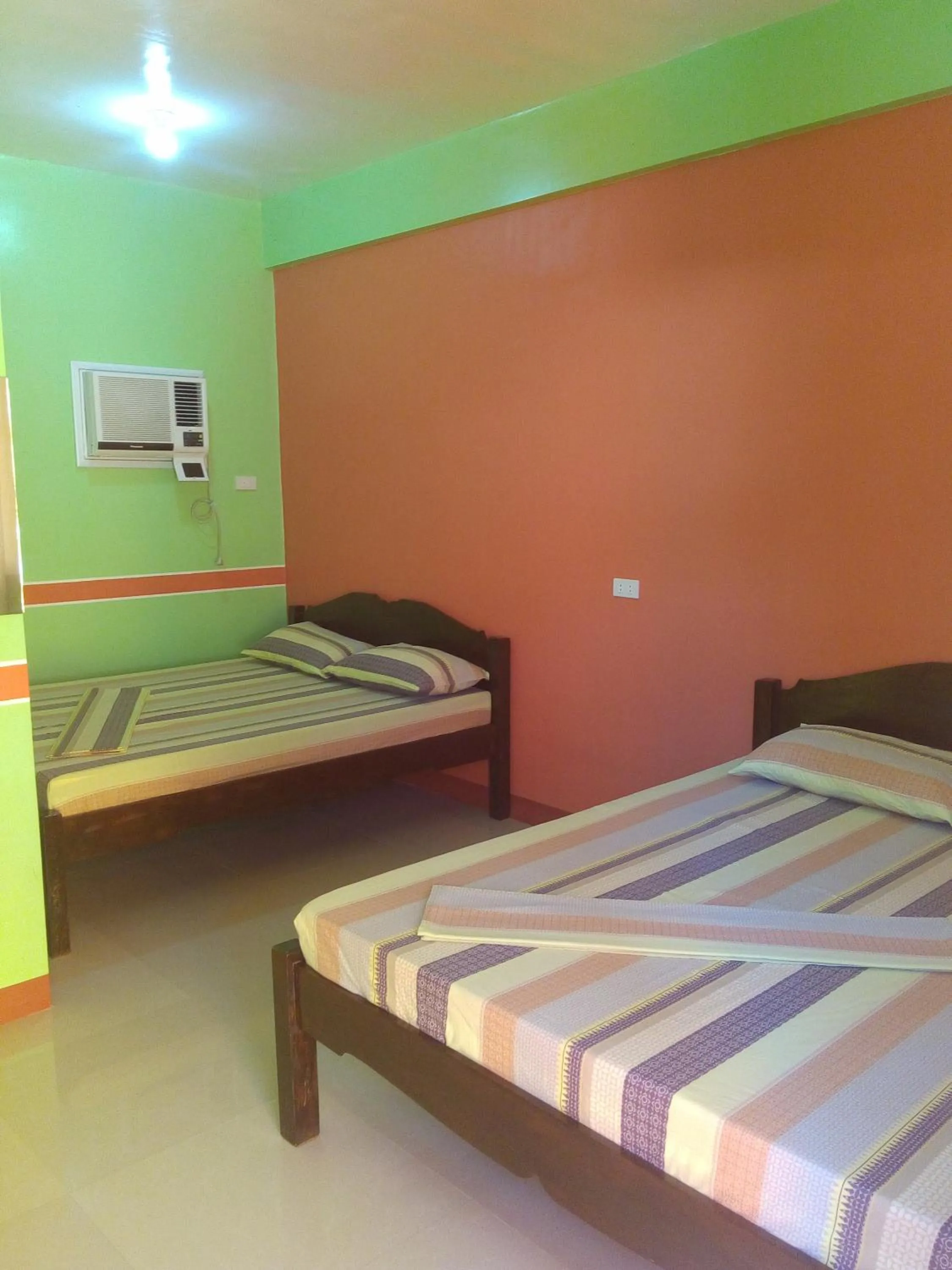 Bed in Queen of Isle Cottages and Restaurant