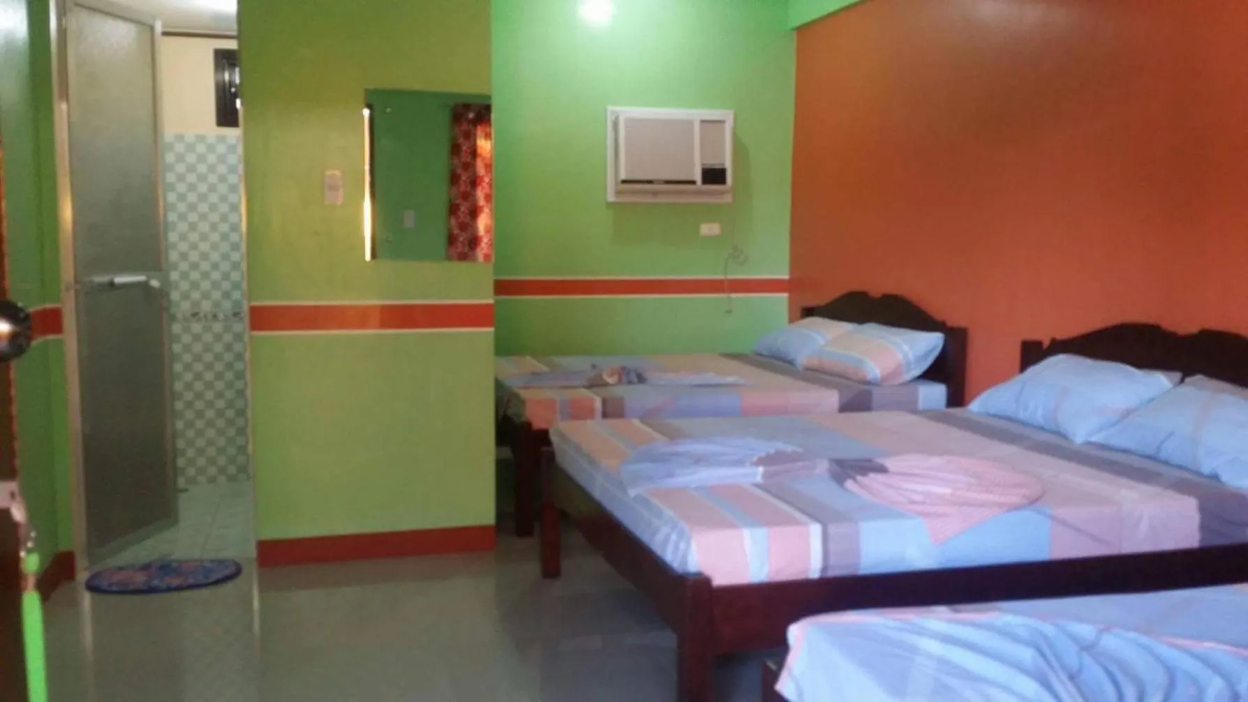 Bed in Queen of Isle Cottages and Restaurant