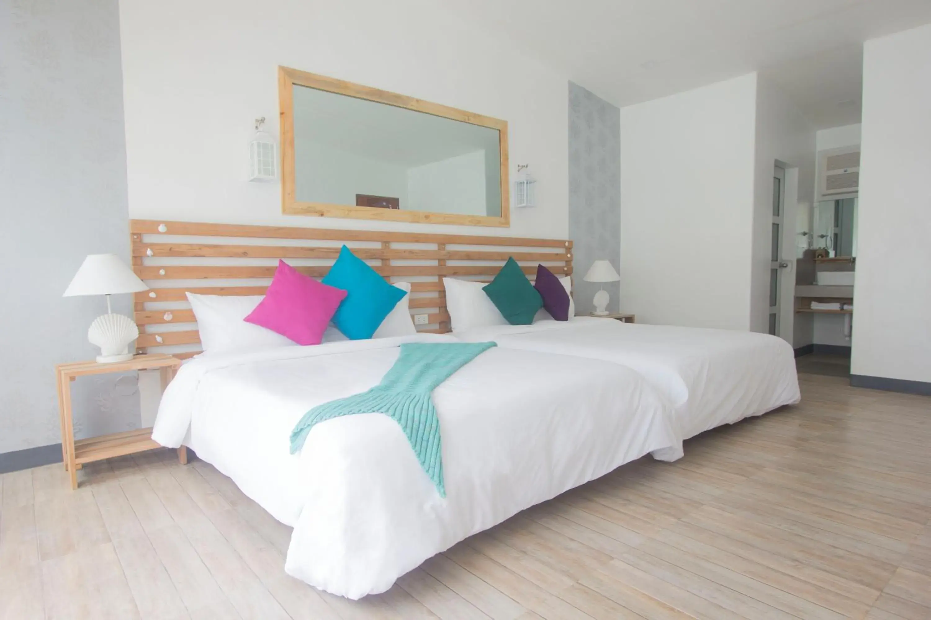 Bed in L'Sirene Boutique Resort Bed in L'Sirene Boutique Resort