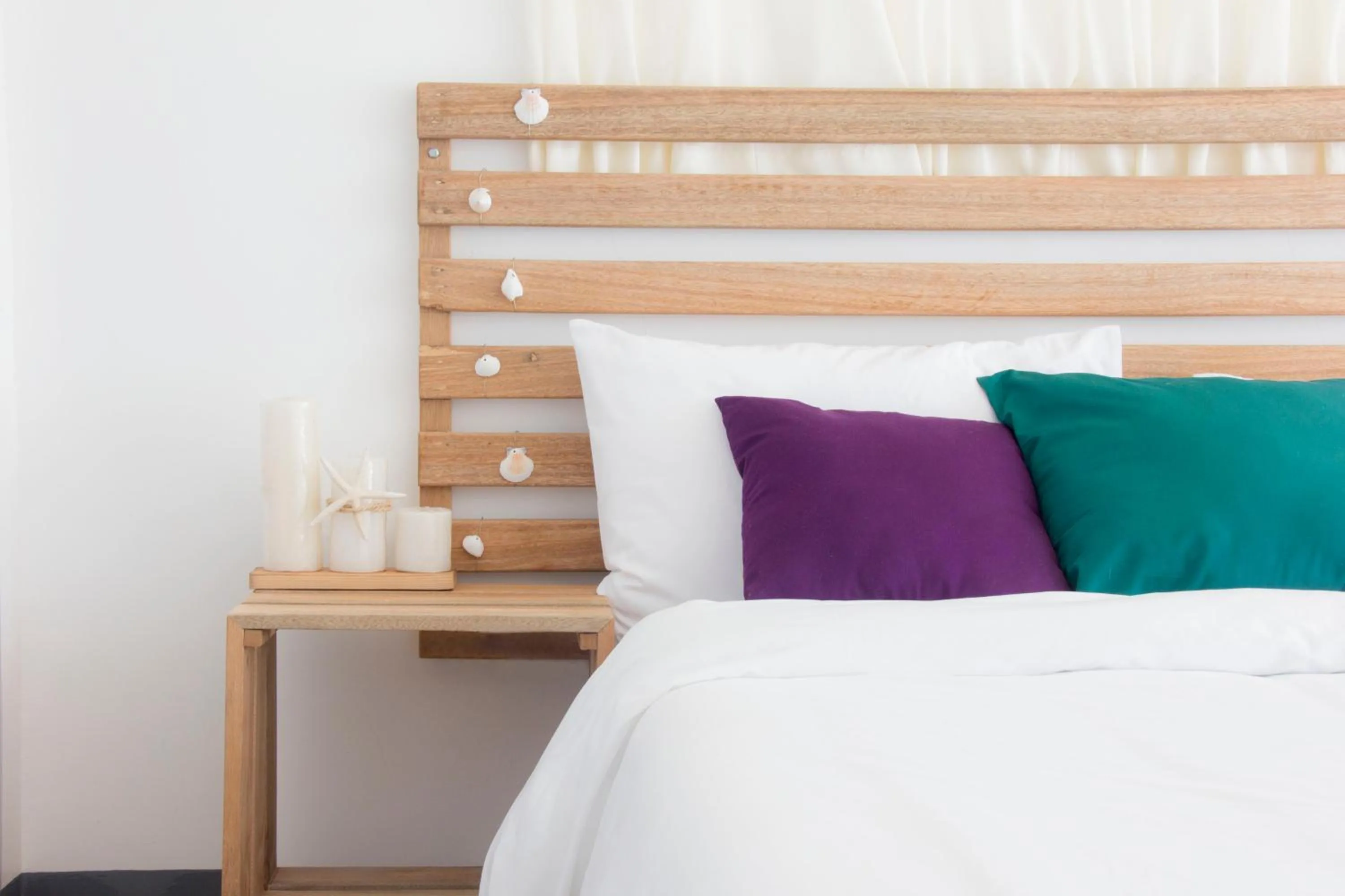 Bed in L'Sirene Boutique Resort