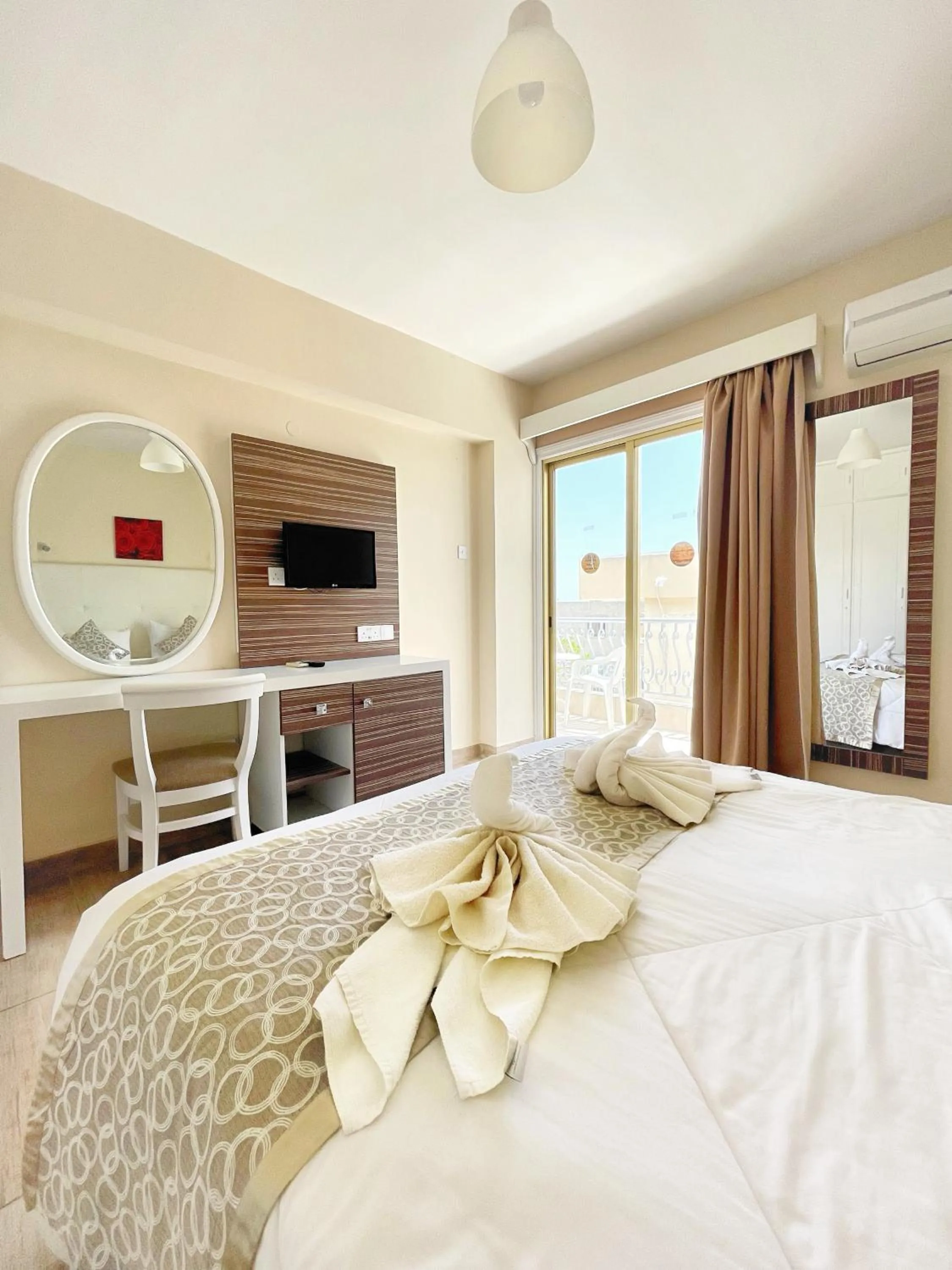 Bed in Antonis G. Hotel Apartments