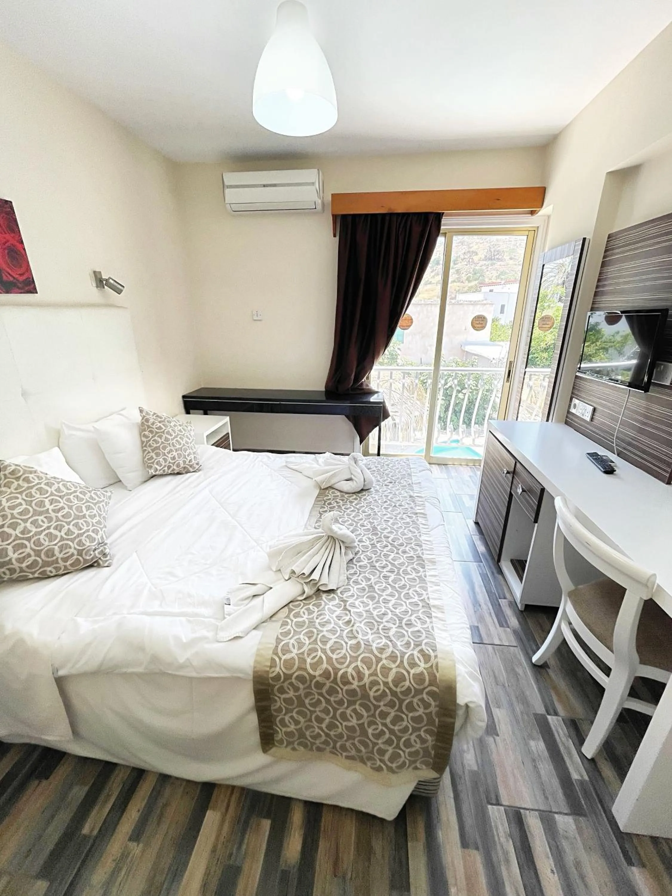 Bed in Antonis G. Hotel Apartments