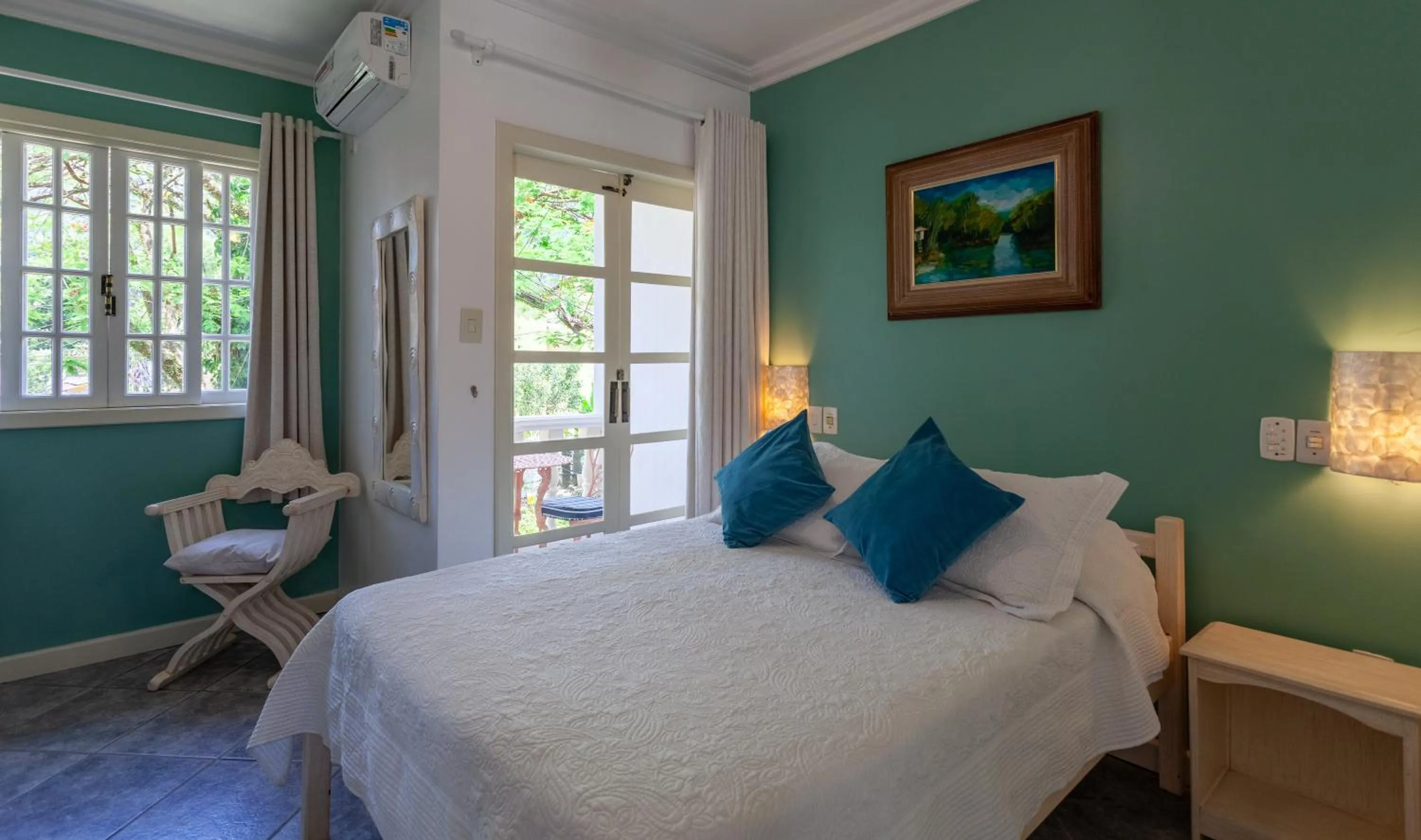 Bed in Pousada Casablanca