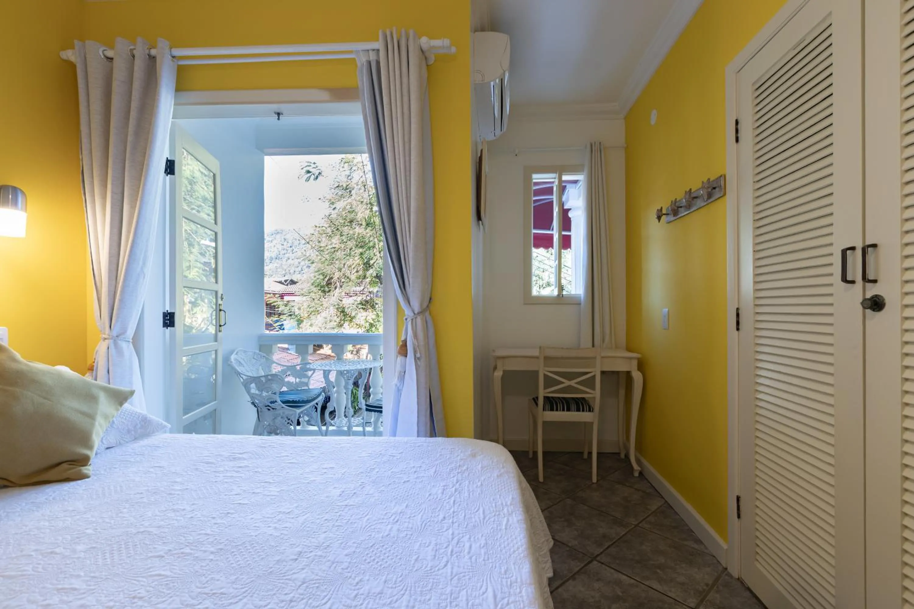 Bed in Pousada Casablanca