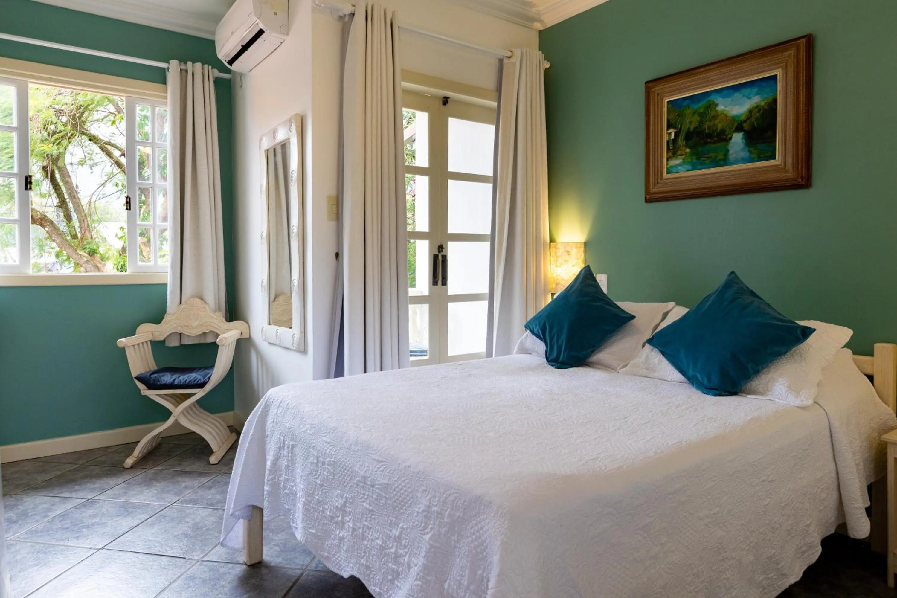 Bed in Pousada Casablanca