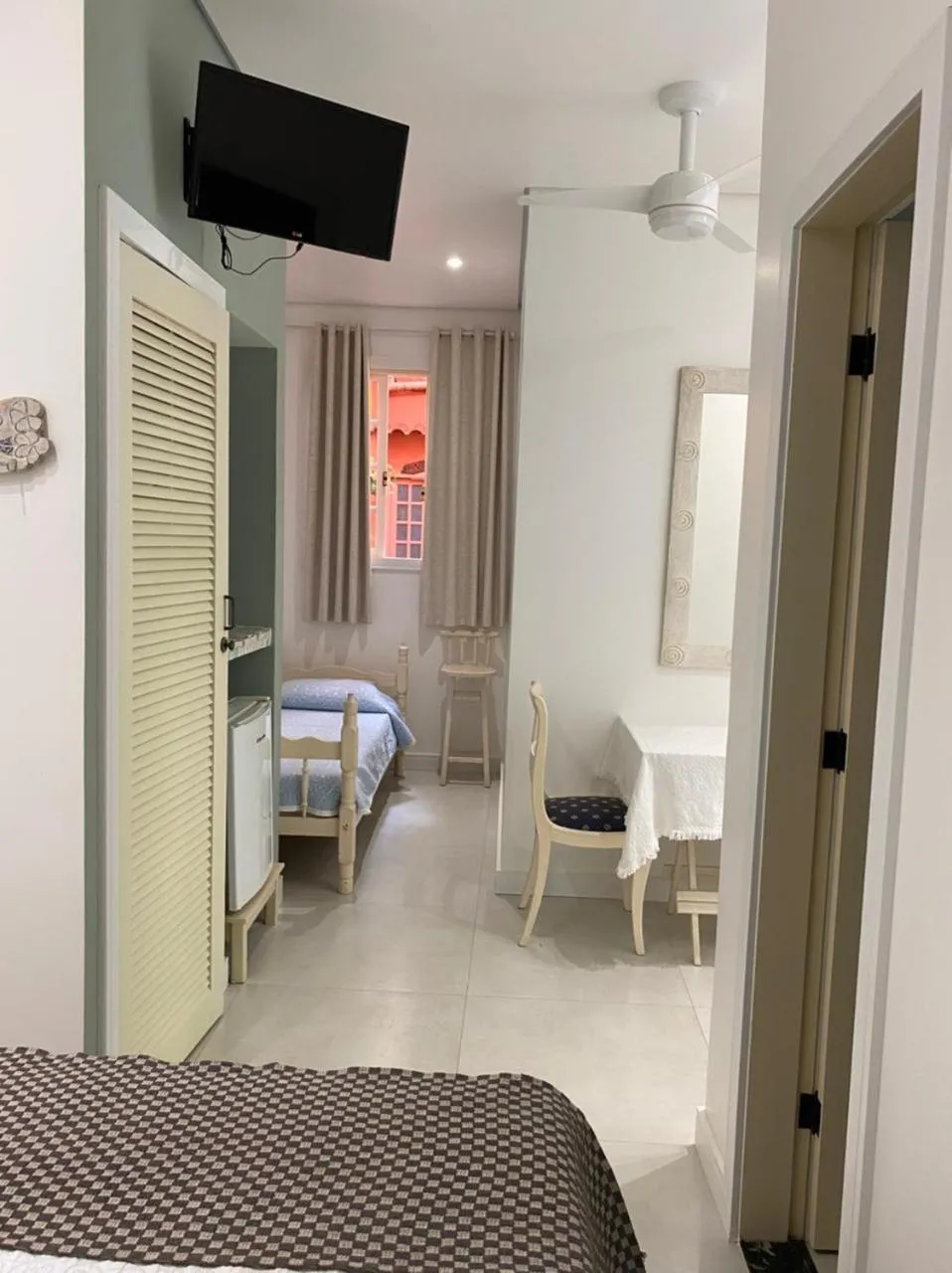 Communal lounge/ TV room, Bed in Pousada Casablanca