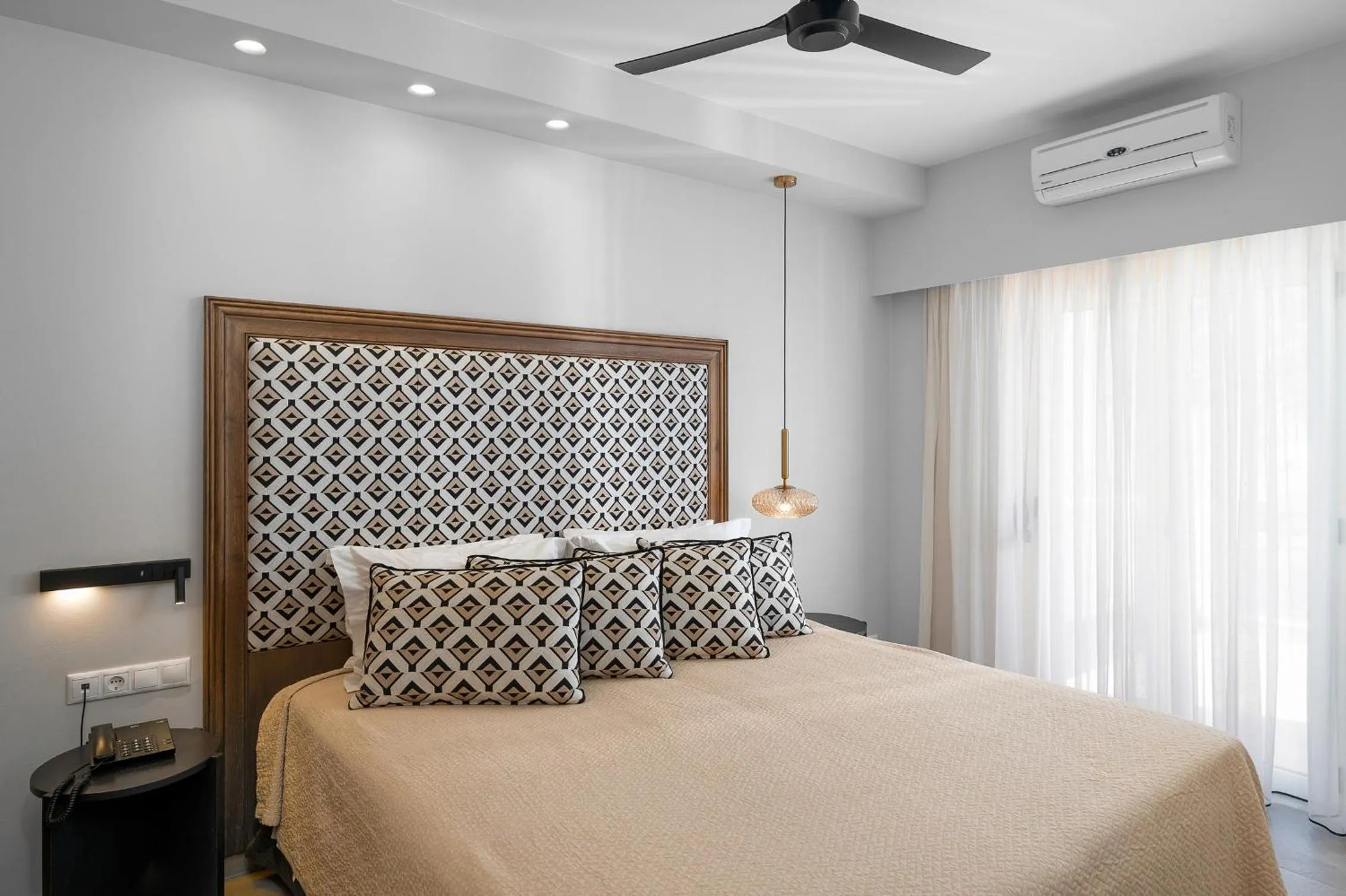 Bed in Glaros Hotel Apartment