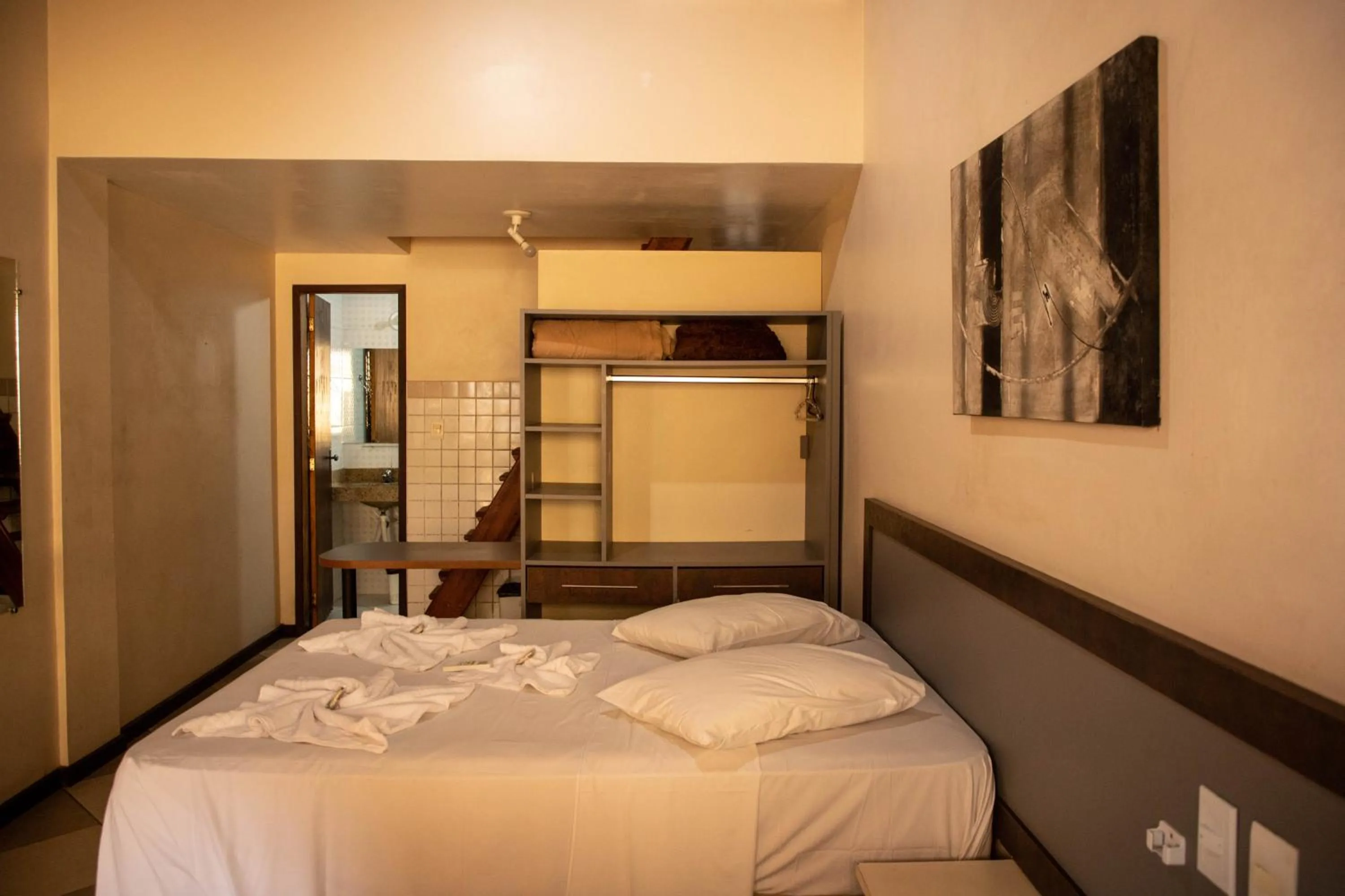 Bed in Lonier Praia Inn Flats