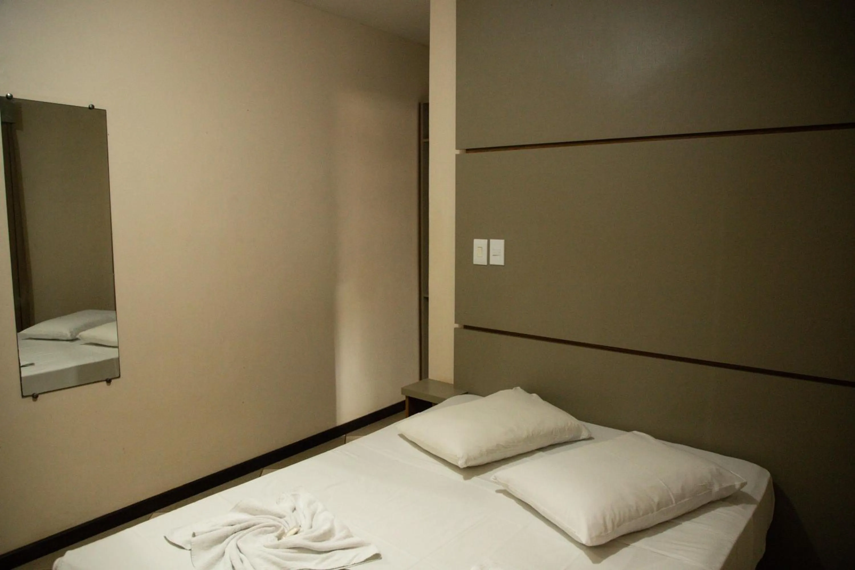 Bed in Lonier Praia Inn Flats