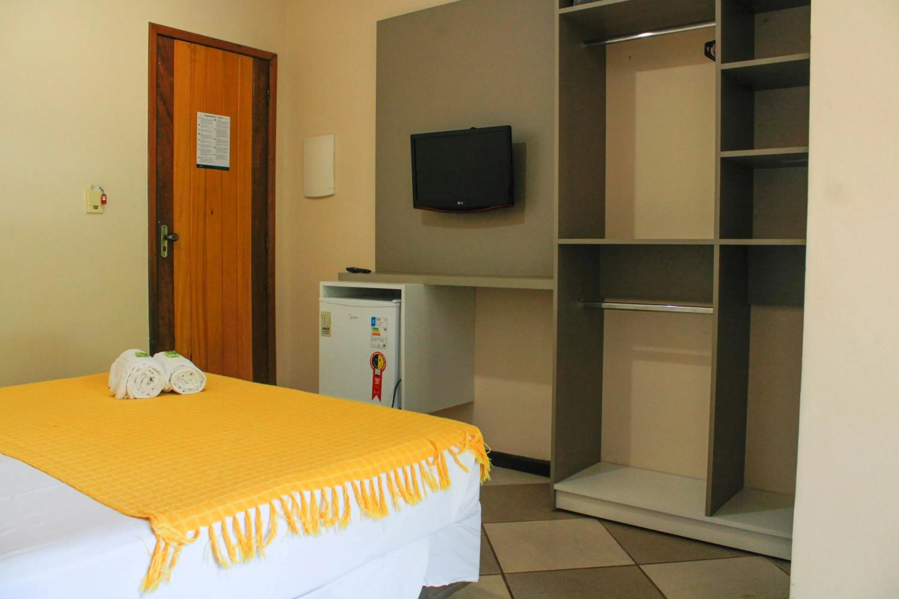 Bed in Lonier Praia Inn Flats