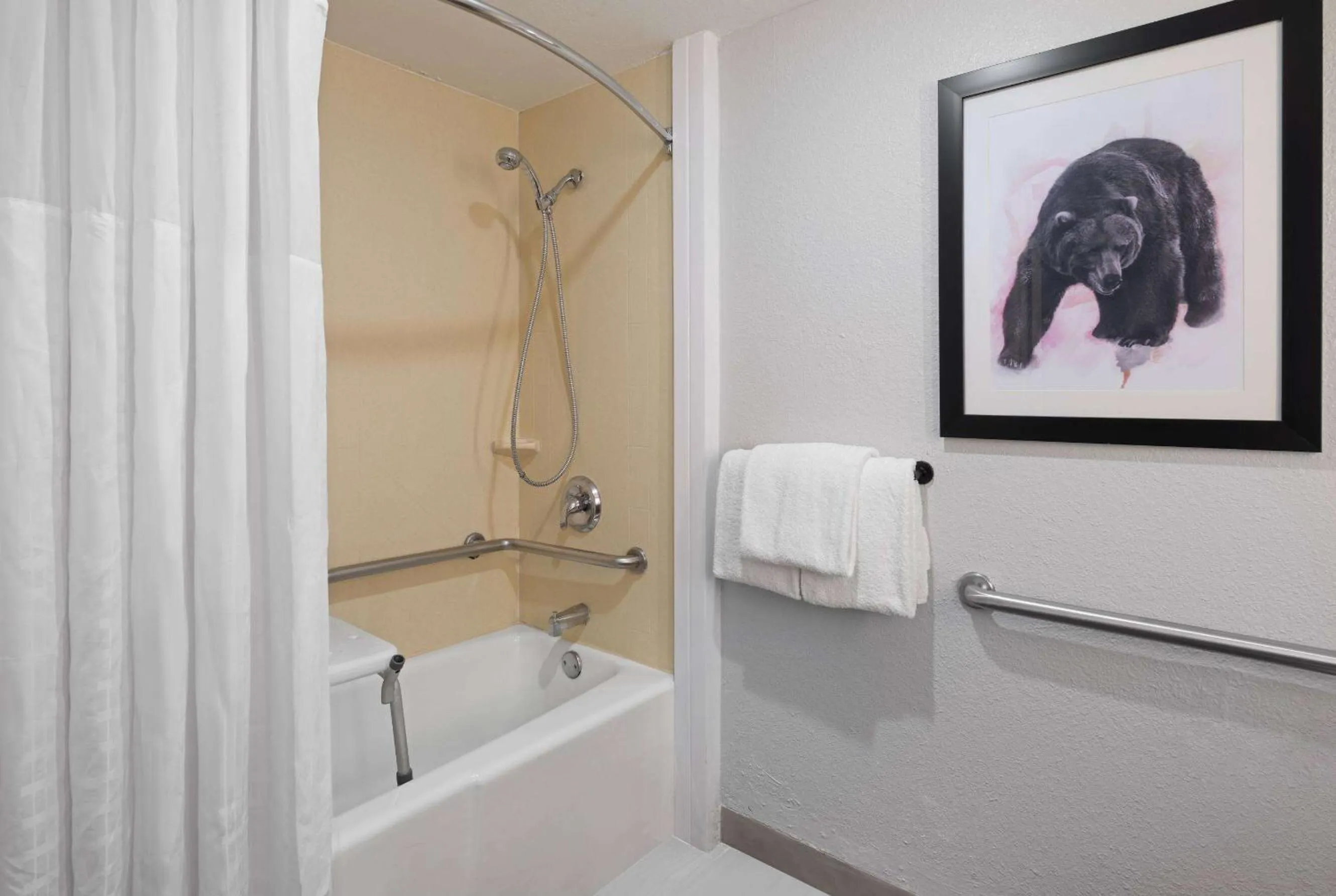 Bathroom in AmericInn by Wyndham Casper Event Center Area