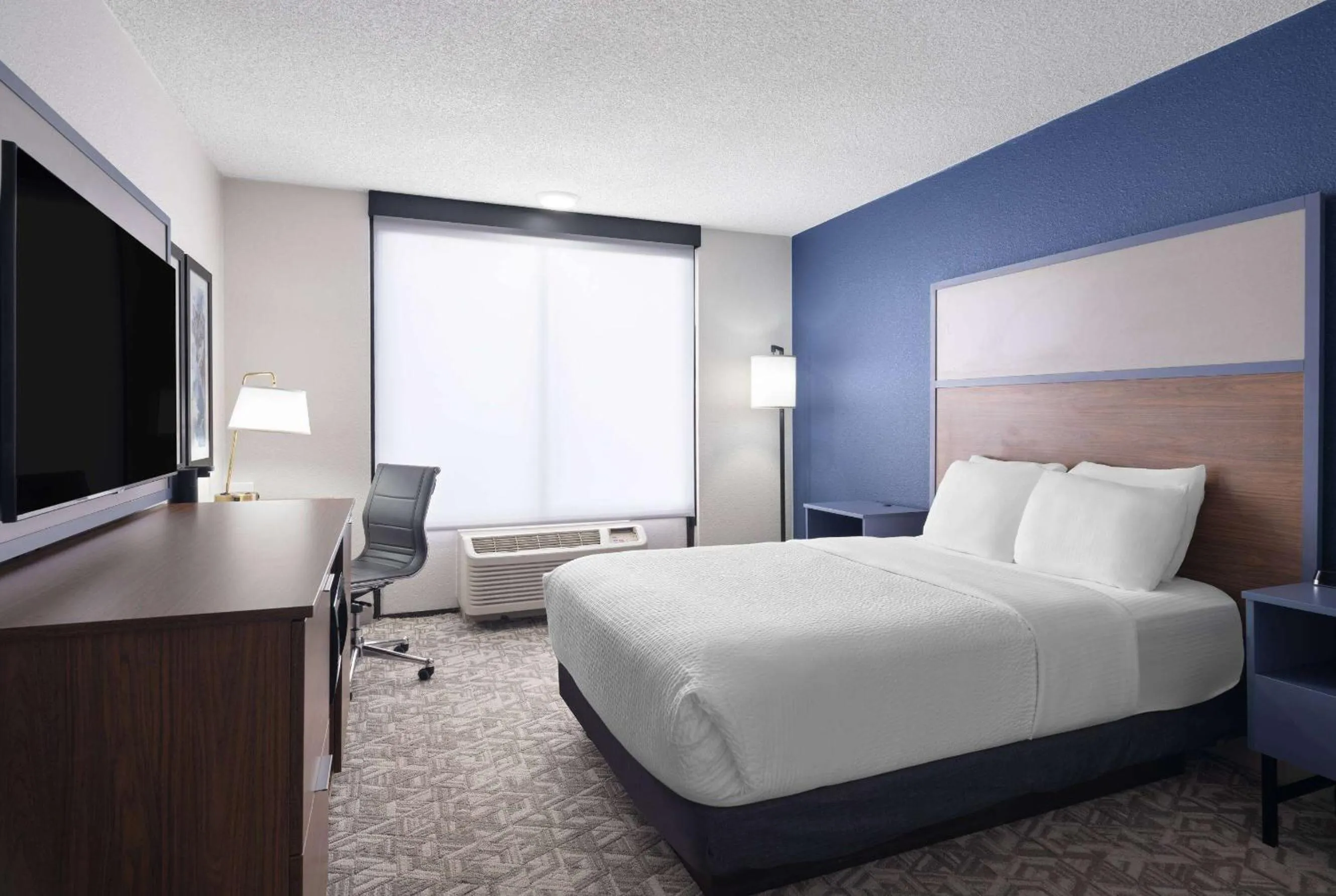 Photo of the whole room, Bed in AmericInn by Wyndham Casper Event Center Area