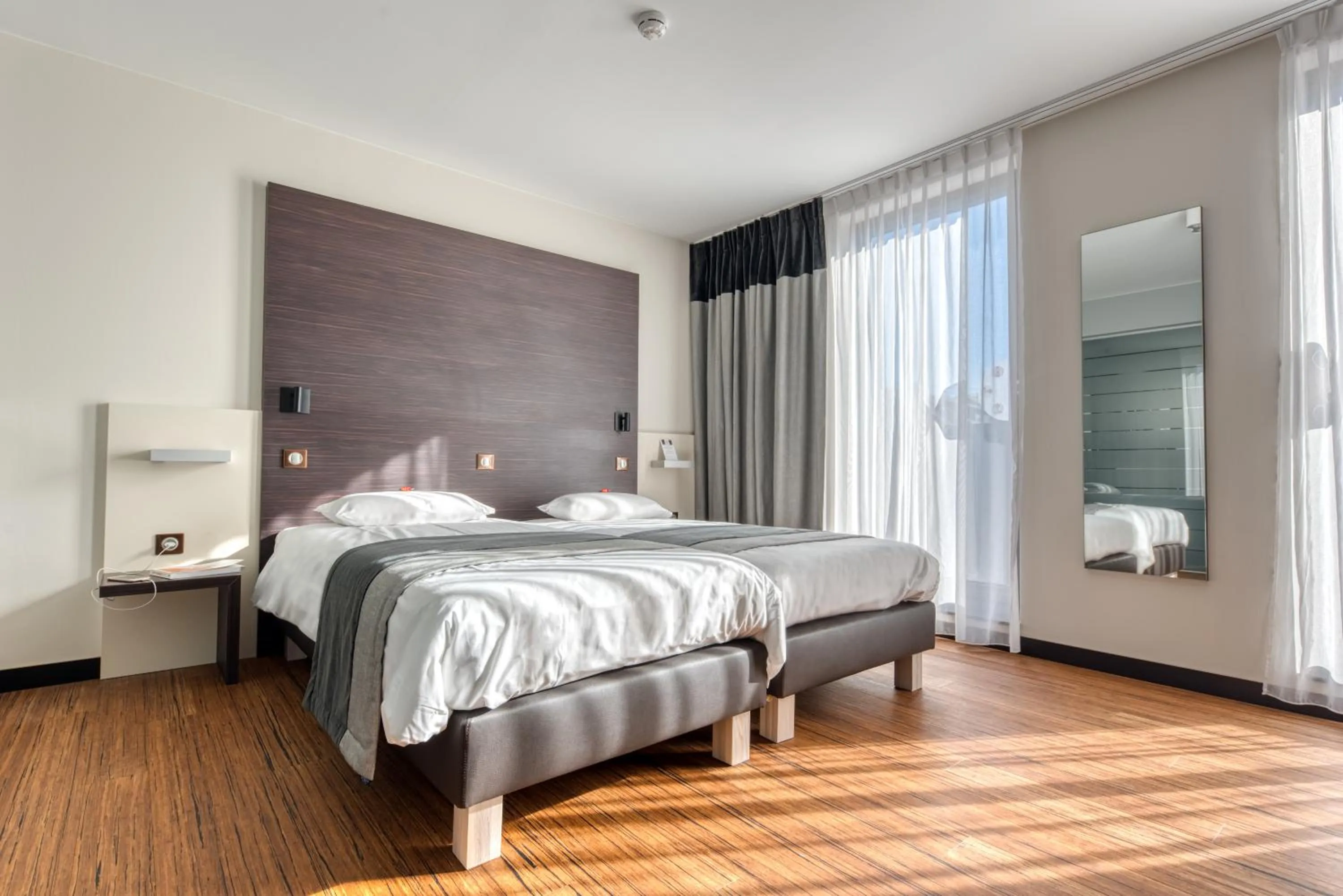 Bed in Le Merceny Motel